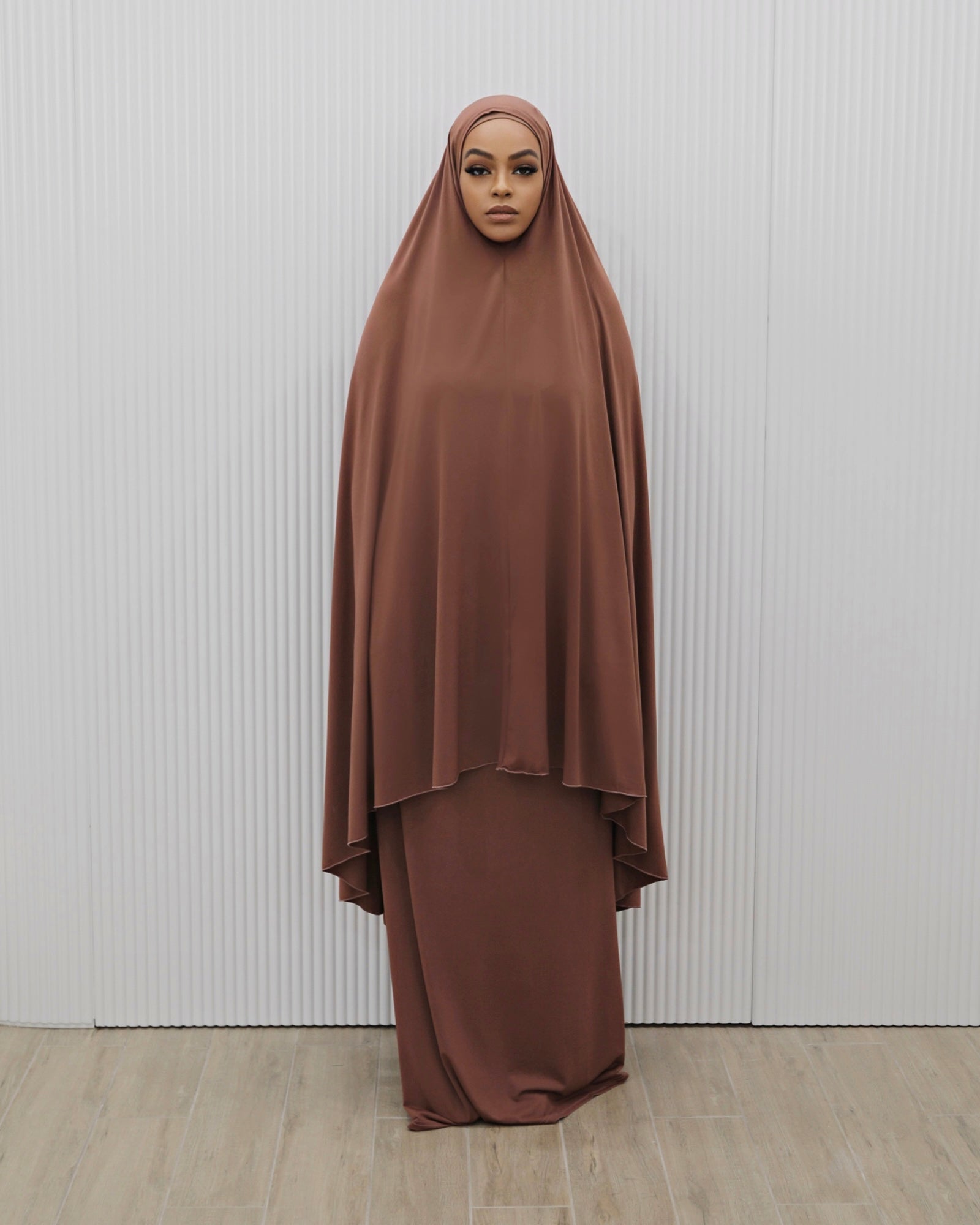 Signature prayer set in a soft, loose-fitting fabric, featuring a large Dusty Rose jilbab and a matching floor-length skirt for comfortable, full-coverage wear.