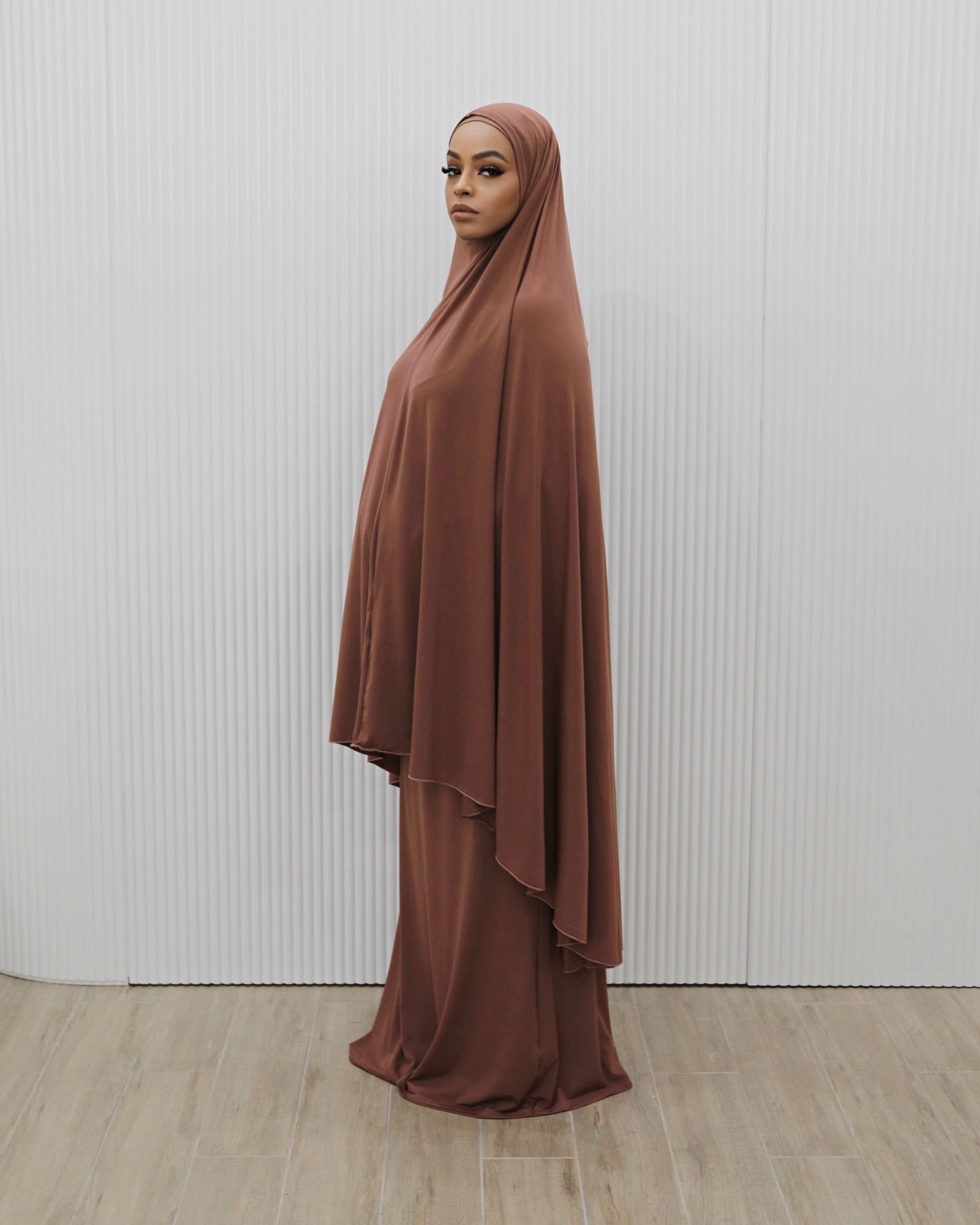 Signature prayer set in a soft, loose-fitting fabric, featuring a large Dusty Rose jilbab and a matching floor-length skirt for comfortable, full-coverage wear.