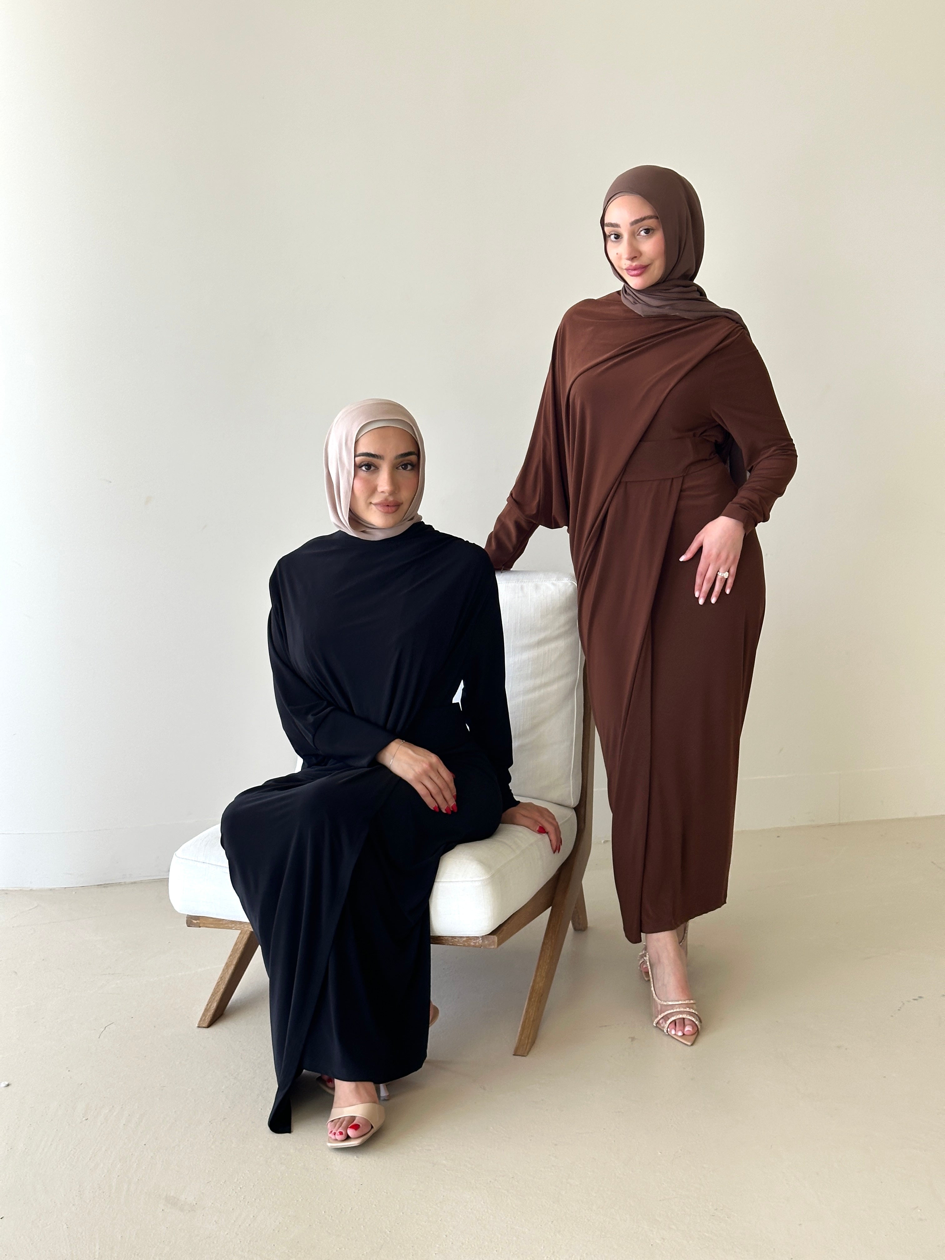 Crafted from a soft, breathable jersey fabric, this dress drapes beautifully over the silhouette while offering stretch and movement that feels as comfortable as it looks.