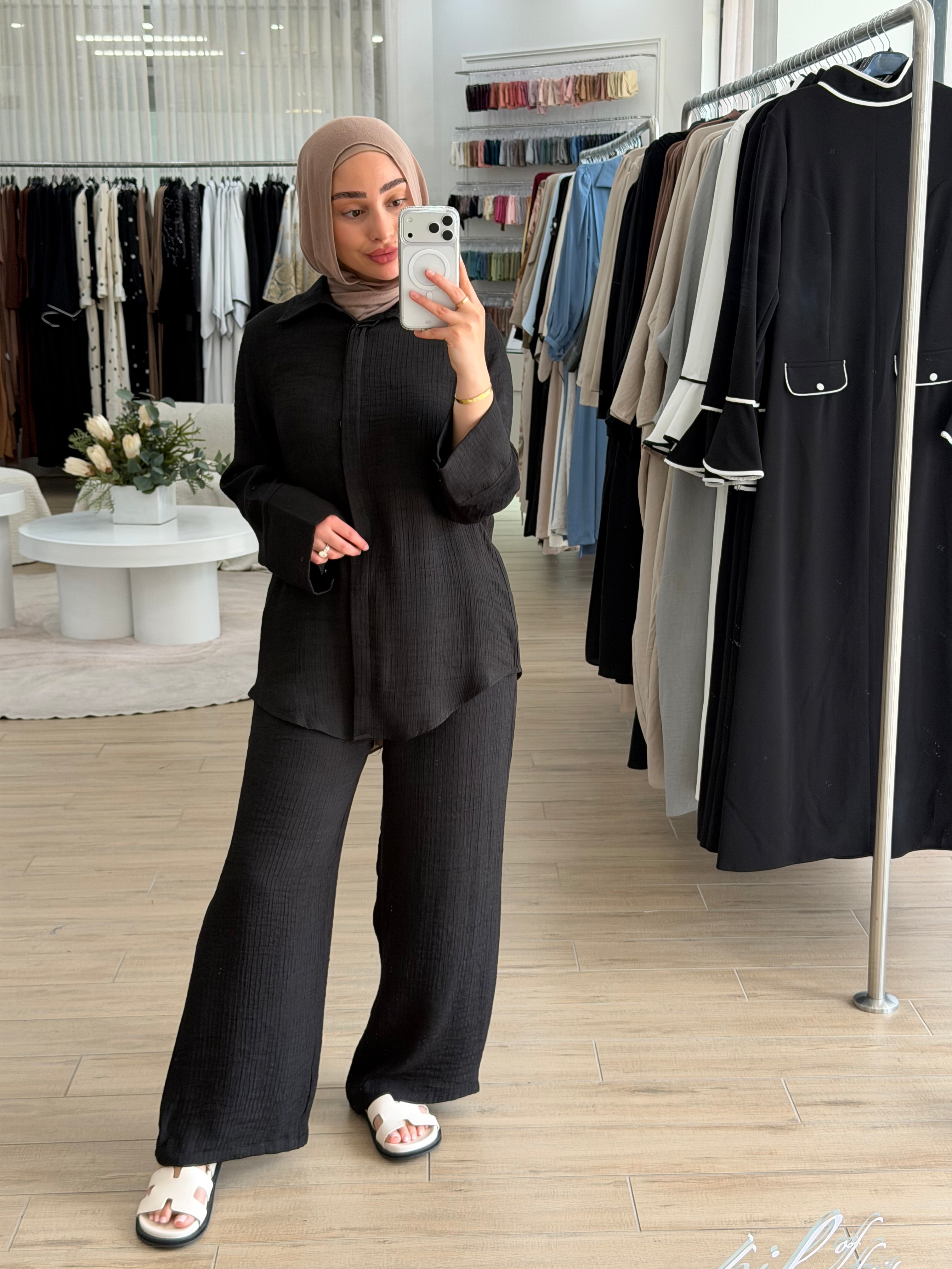 A beautifully coordinated two-piece outfit designed for simple sophistication. This set includes a relaxed-fit top and matching pants, crafted to make refined modest dressing easier than ever.