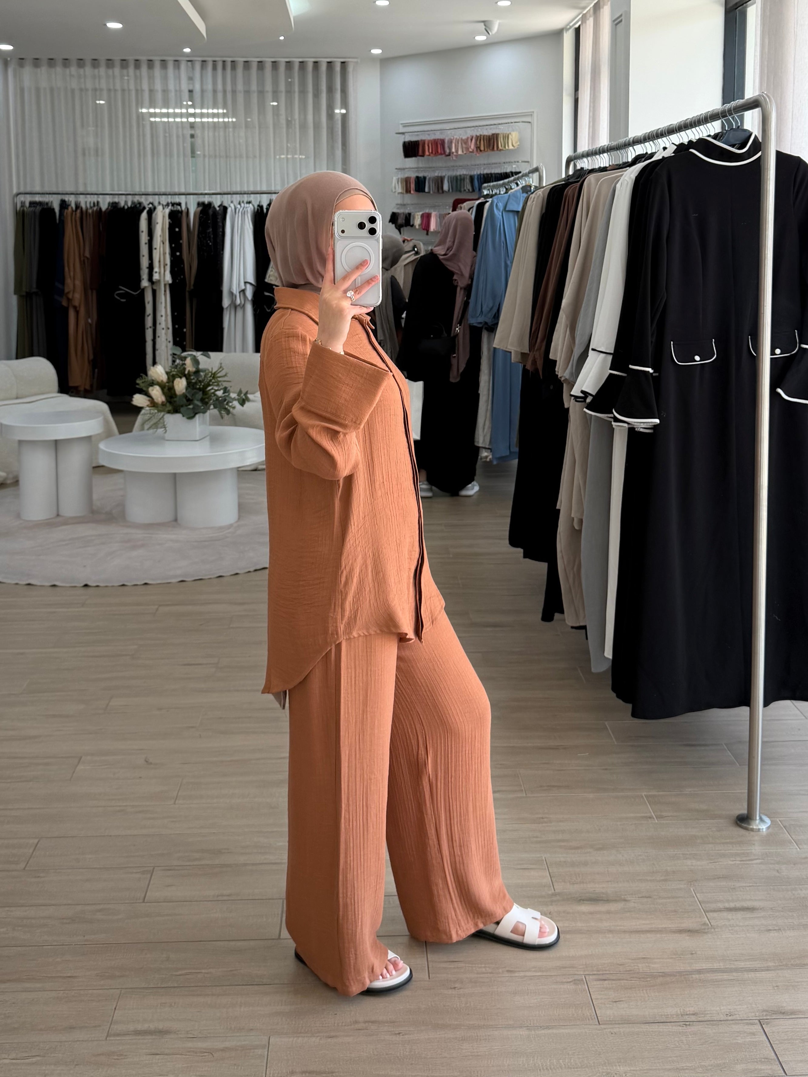A beautifully coordinated two-piece outfit designed for simple sophistication. This set includes a relaxed-fit top and matching pants, crafted to make refined modest dressing easier than ever.