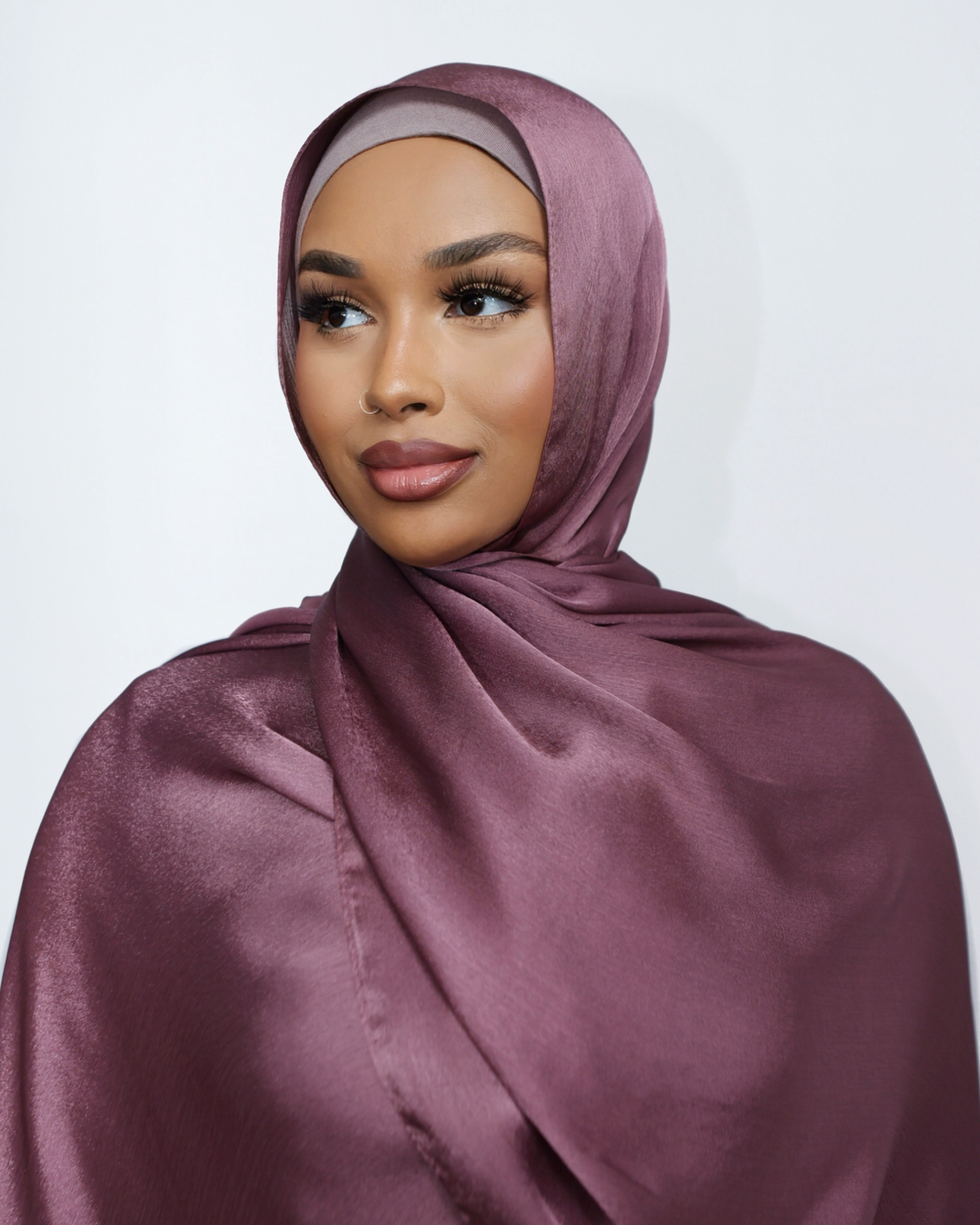 Shimmer Hijab, lightweight with a sparkling, shimmery finish, designed to add a glamorous touch to elevated outfits and formal wear.