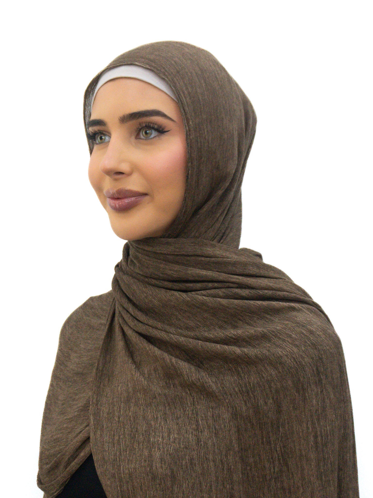 Hijab crafted from soft 100% rayon with subtle textured weave, breathable lightweight fabric, and natural flowing drape, 180cm x 80cm.