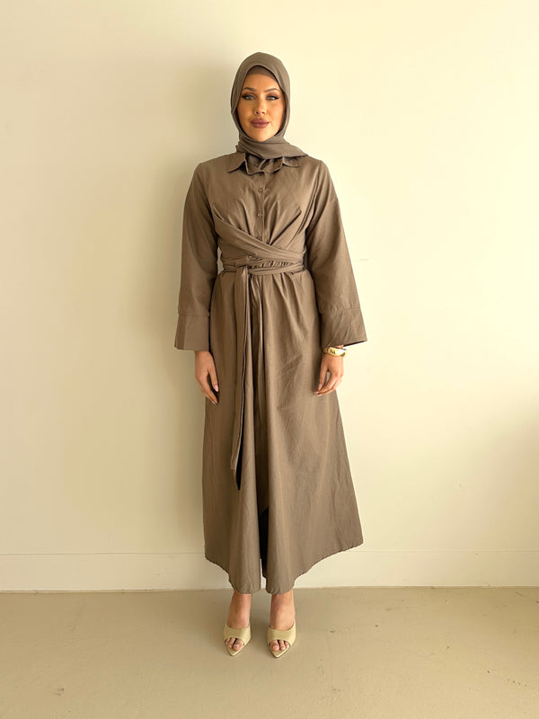 woman wearing modest long sleeve maxi spring/summer dress in mocha, full length, lightweight and wrap dress with buttons