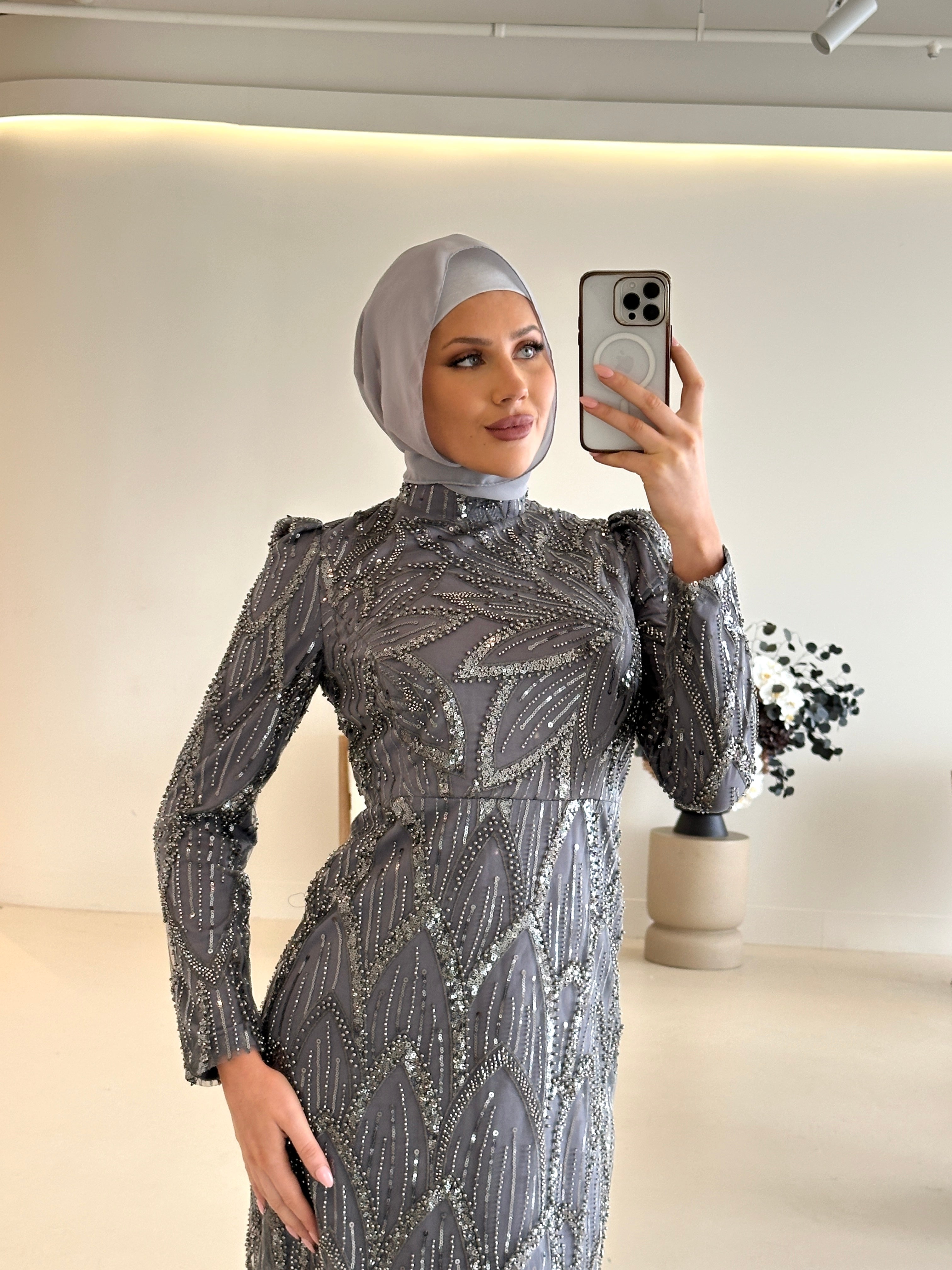 women wearing modest embellished formal dress, maxi, long sleeve with hijab in grey
