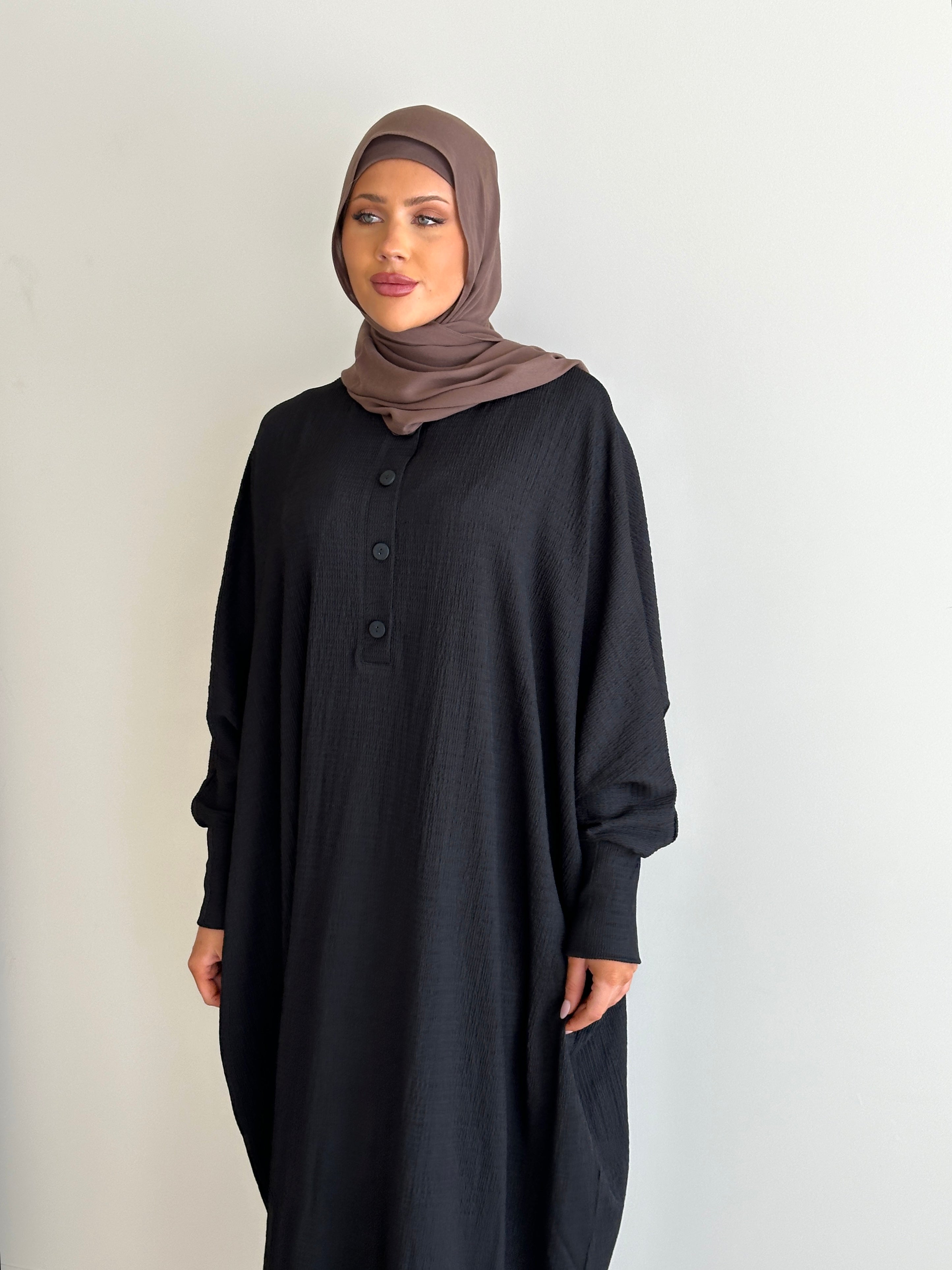 women's oversize abaya, maxi dress with long sleeves and full length, lightweight with buttons and modest for all seasons.