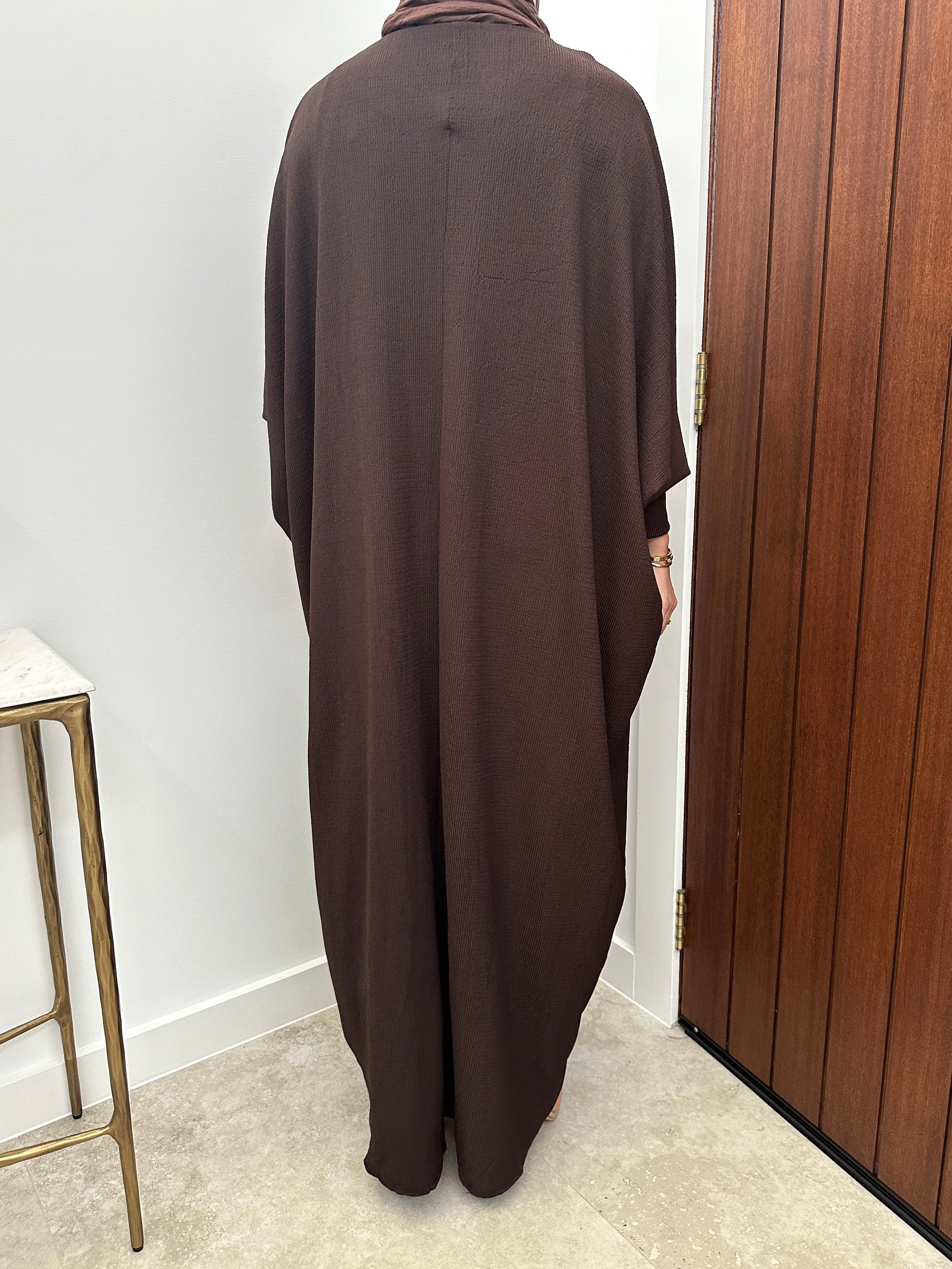 women's oversize abaya, maxi dress with long sleeves and full length, lightweight with buttons and modest for all seasons.
