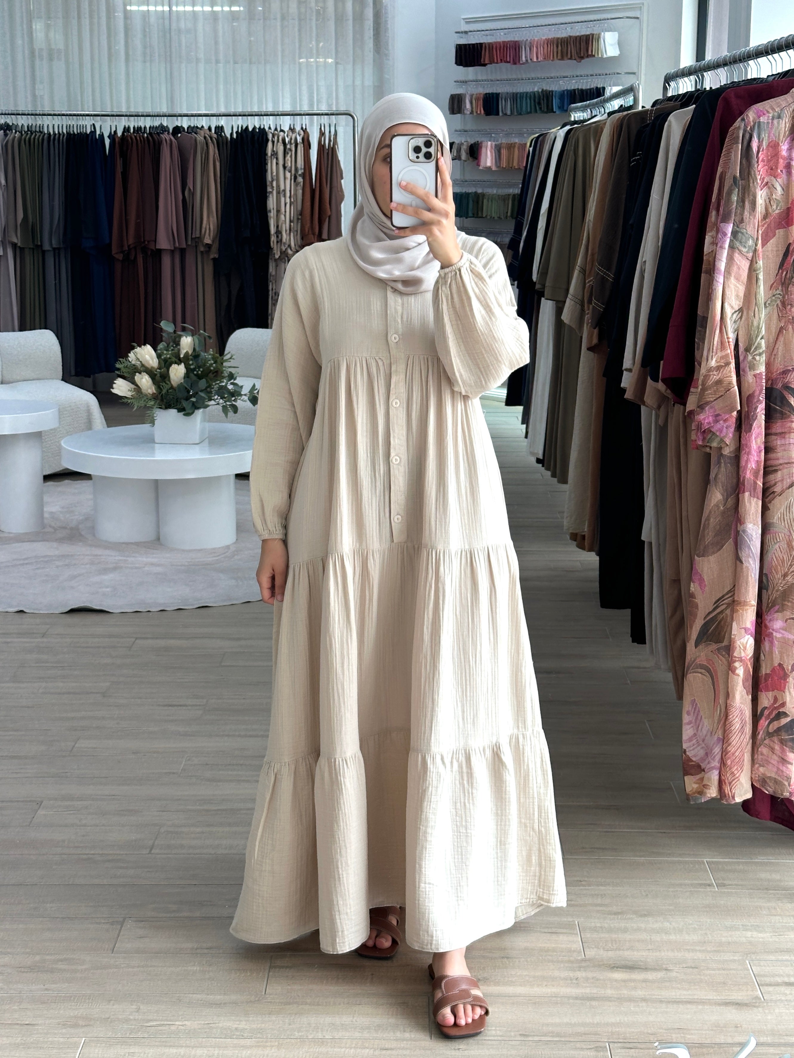 women's maxi full length dress that is made from cotton, it's lightweight and breathable and has centre front buttons with long sleeves for the modest girls who wear hijab.
