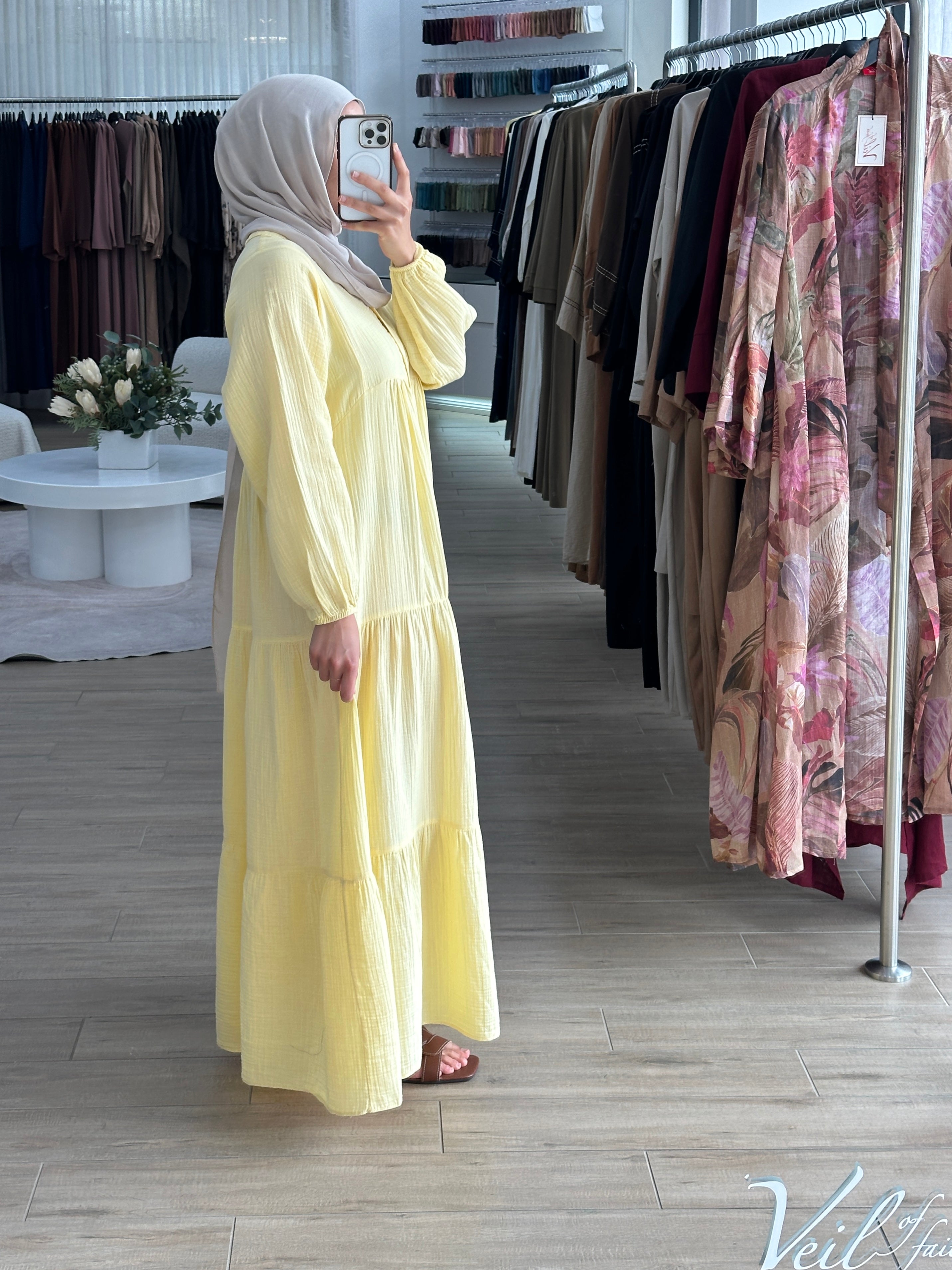 women's maxi full length dress that is made from cotton, it's lightweight and breathable and has centre front buttons with long sleeves for the modest girls who wear hijab.