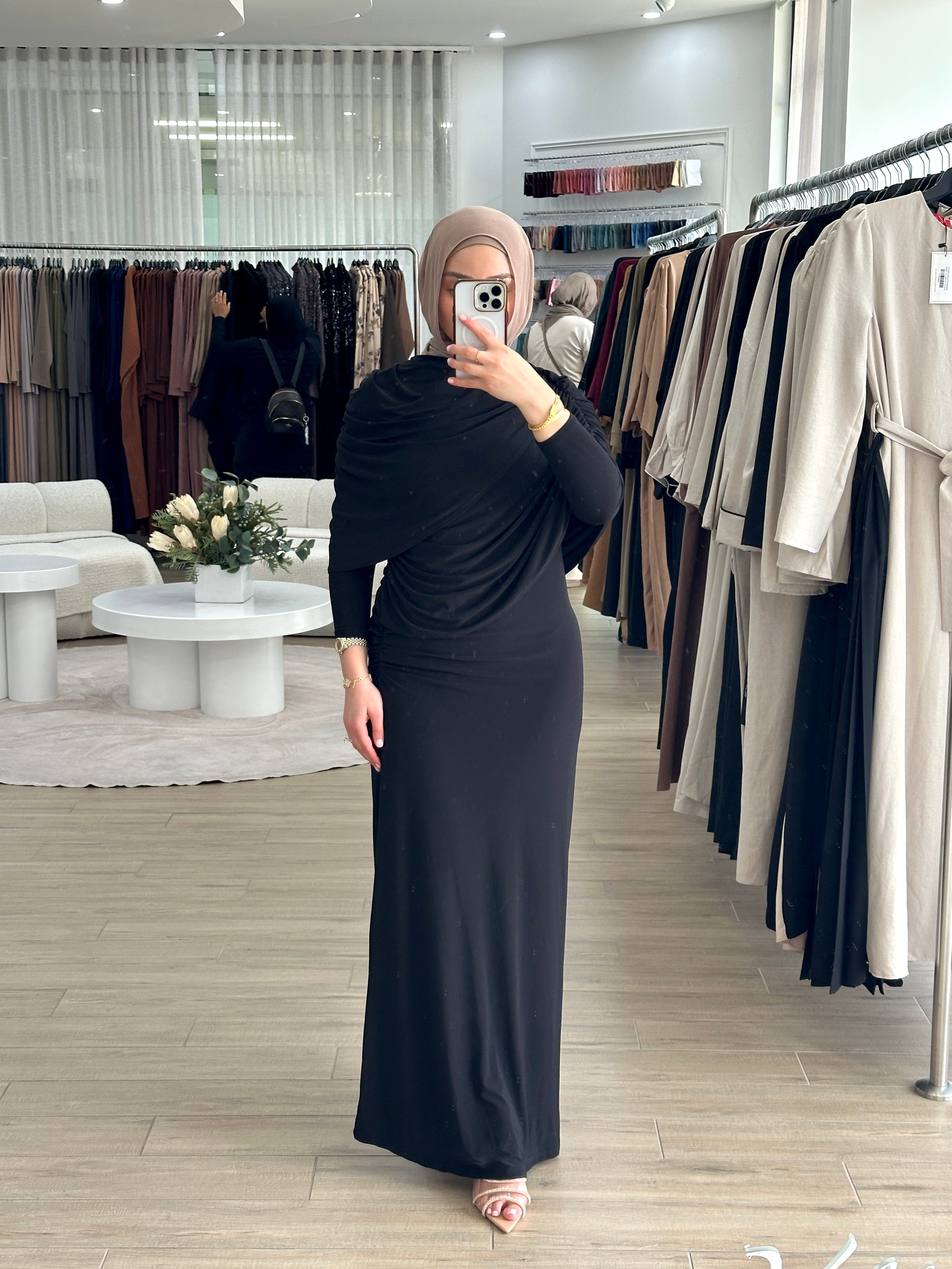 women's full length maxi formal dress in black, jersey fabrication with drape and ruching for parties, occasions, events, engagements, weddings. modest and lightweight with long sleeves.
