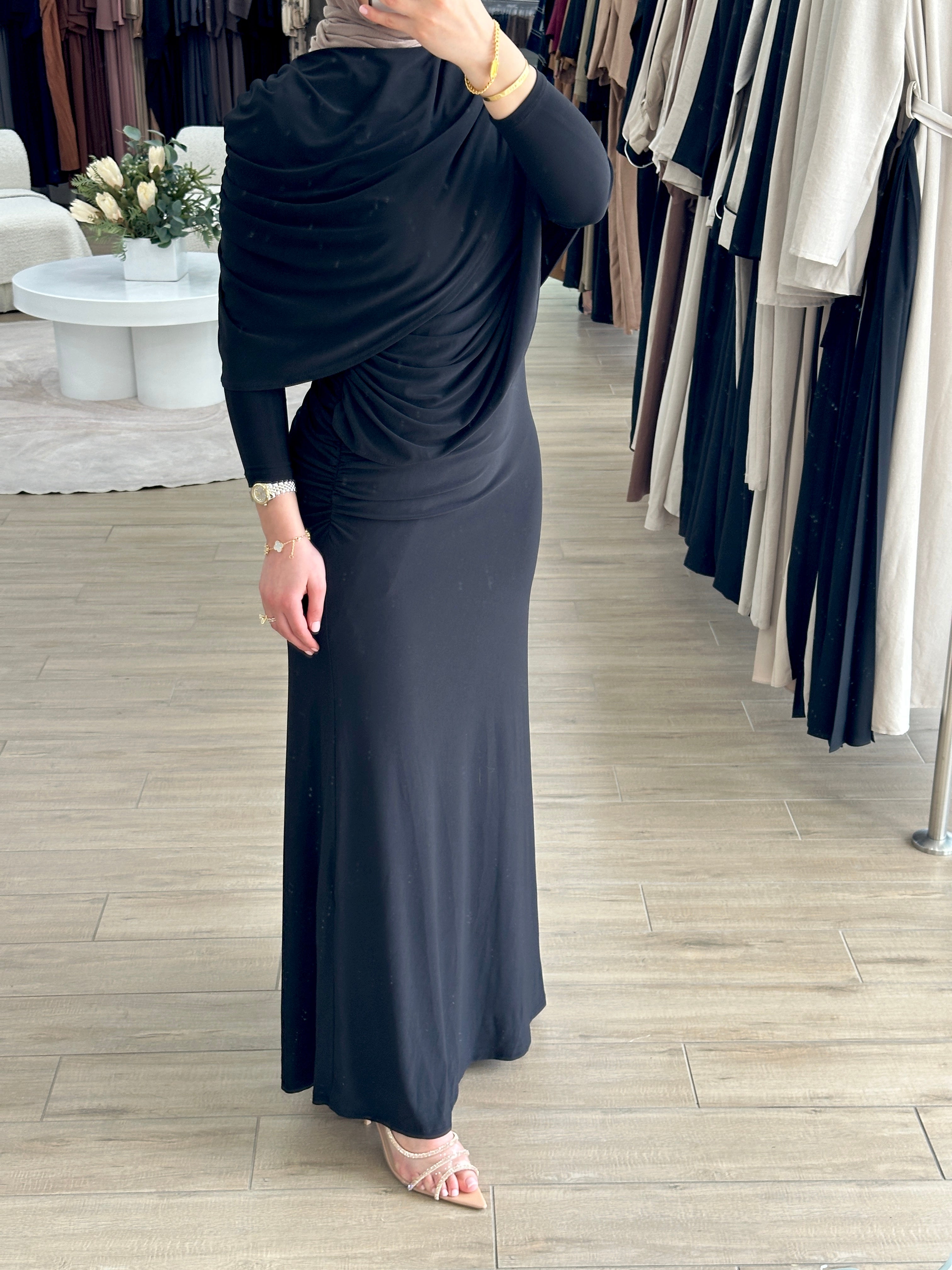 women's full length maxi formal dress in black, jersey fabrication with drape and ruching for parties, occasions, events, engagements, weddings. modest and lightweight with long sleeves.