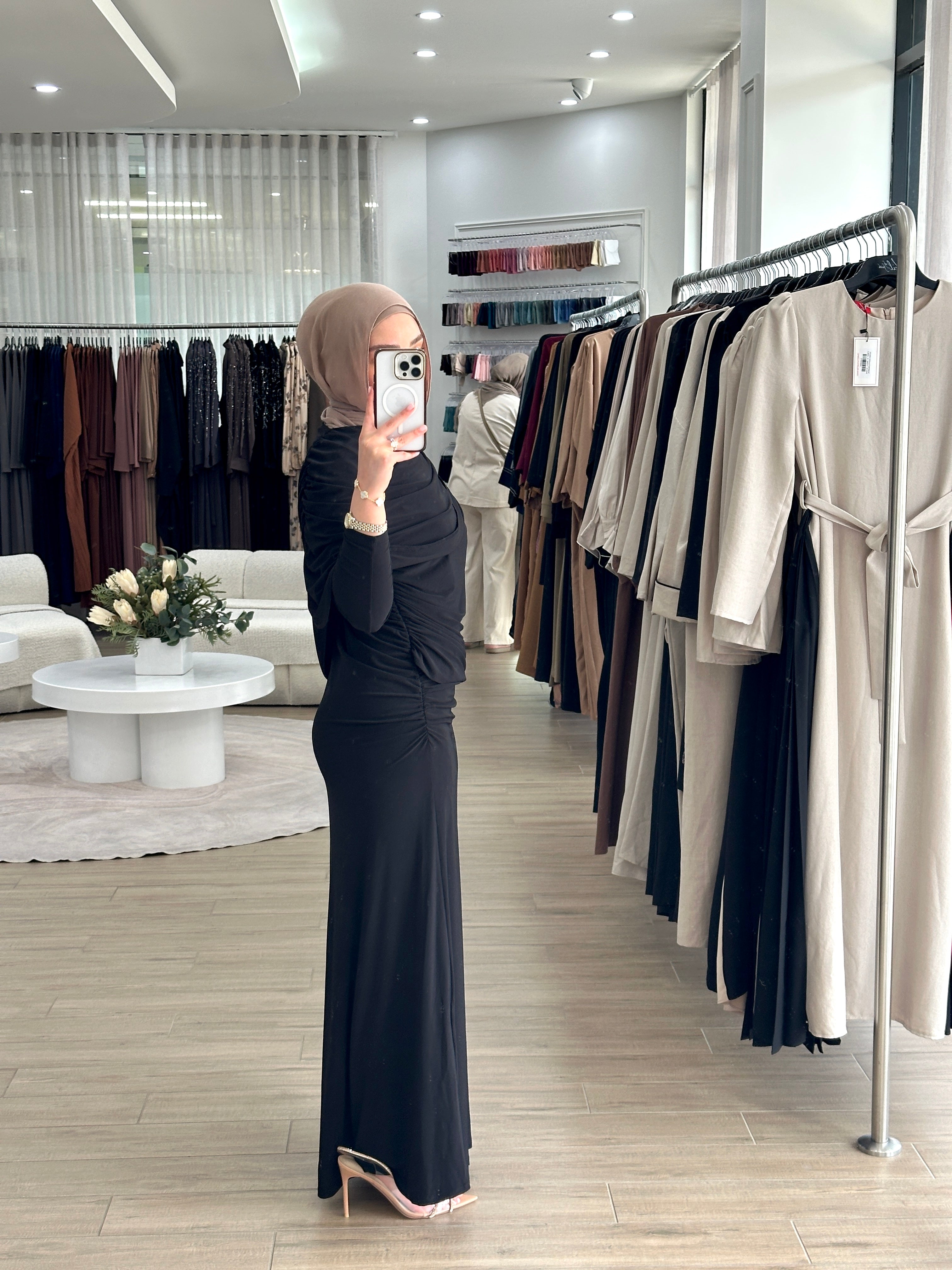 women's full length maxi formal dress in black, jersey fabrication with drape and ruching for parties, occasions, events, engagements, weddings. modest and lightweight with long sleeves.