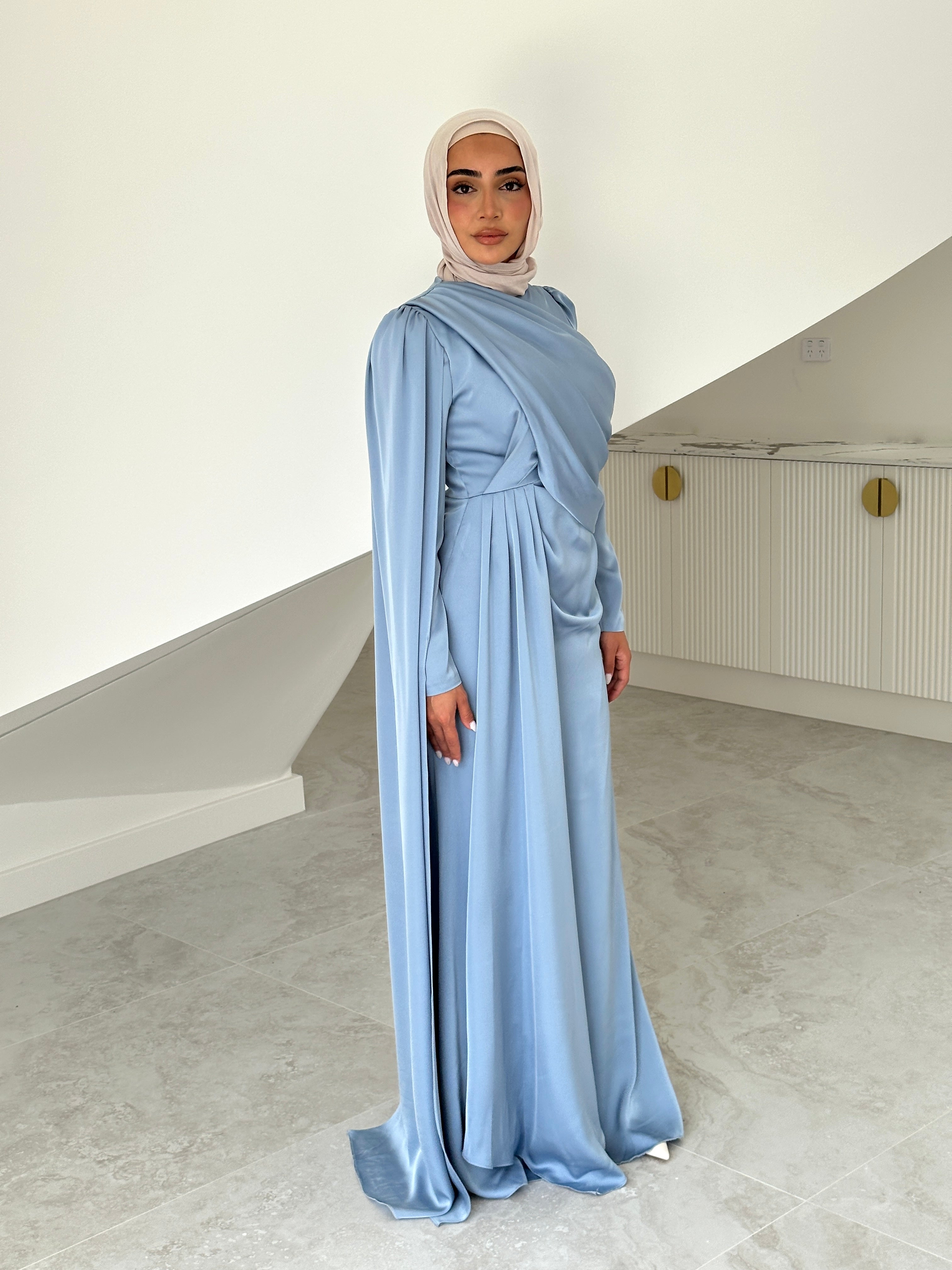 women's full length formal dress in satin, maxi with long sleeves. soft satin drape in lightweight fabrication for spring summer day or night event. hijabi friendly, modest and full coverage for prom, formals, engagements, kk, nikkah, fatiha, wedding guest.