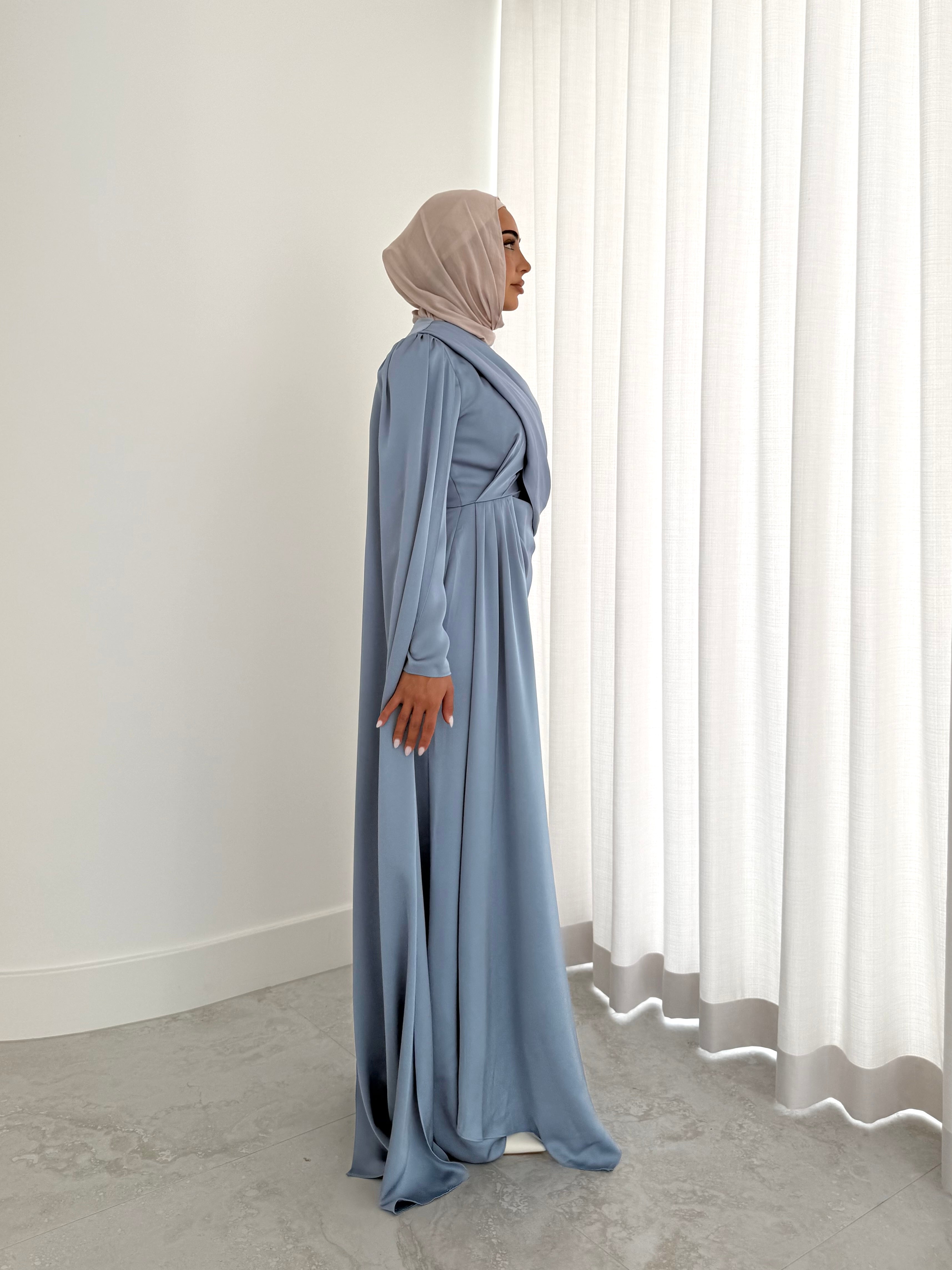women's full length formal dress in satin, maxi with long sleeves. soft satin drape in lightweight fabrication for spring summer day or night event. hijabi friendly, modest and full coverage for prom, formals, engagements, kk, nikkah, fatiha, wedding guest.
