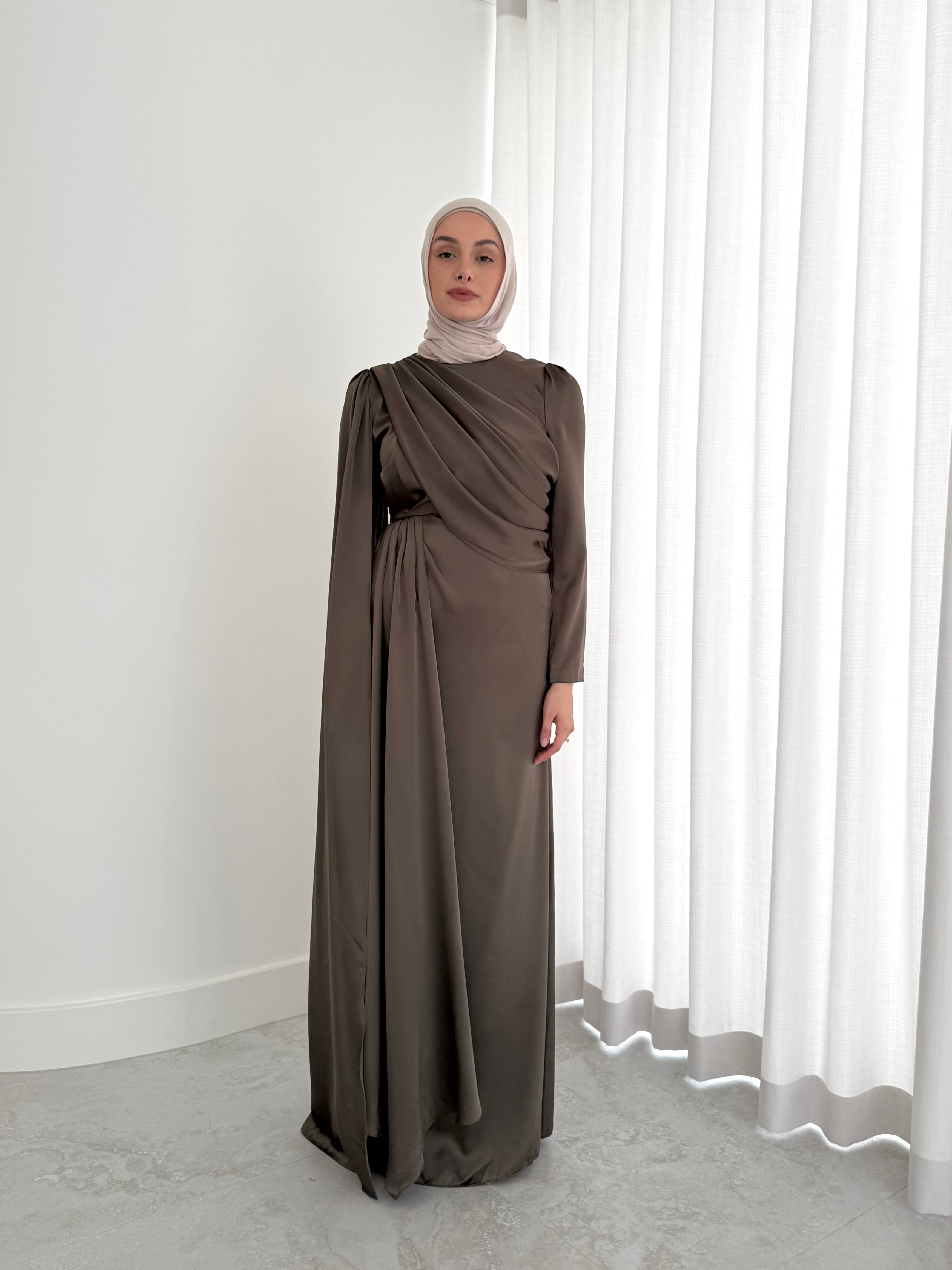 women's full length formal dress in satin, maxi with long sleeves. soft satin drape in lightweight fabrication for spring summer day or night event. hijabi friendly, modest and full coverage for prom, formals, engagements, kk, nikkah, fatiha, wedding guest.