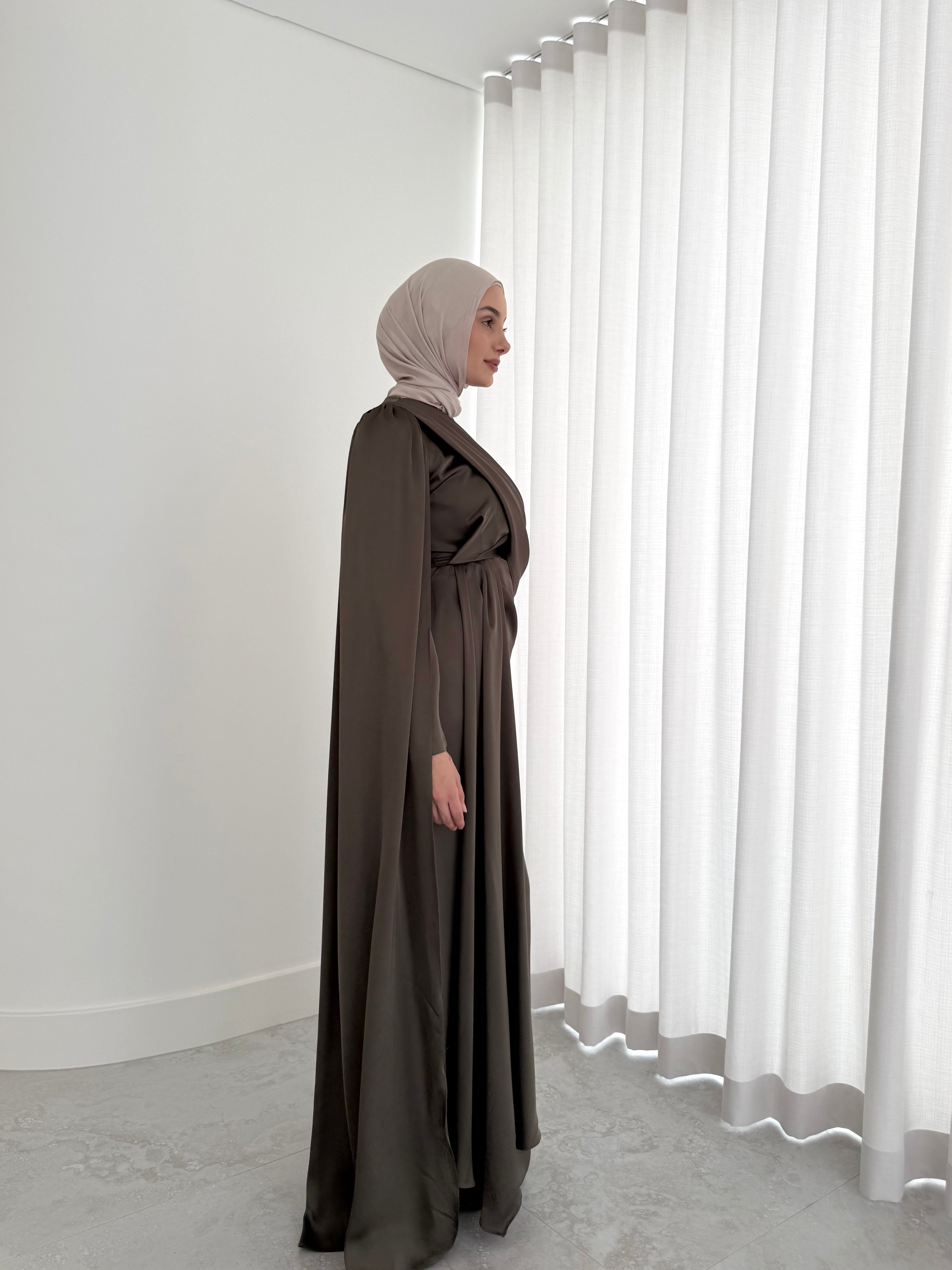 women's full length formal dress in satin, maxi with long sleeves. soft satin drape in lightweight fabrication for spring summer day or night event. hijabi friendly, modest and full coverage for prom, formals, engagements, kk, nikkah, fatiha, wedding guest.