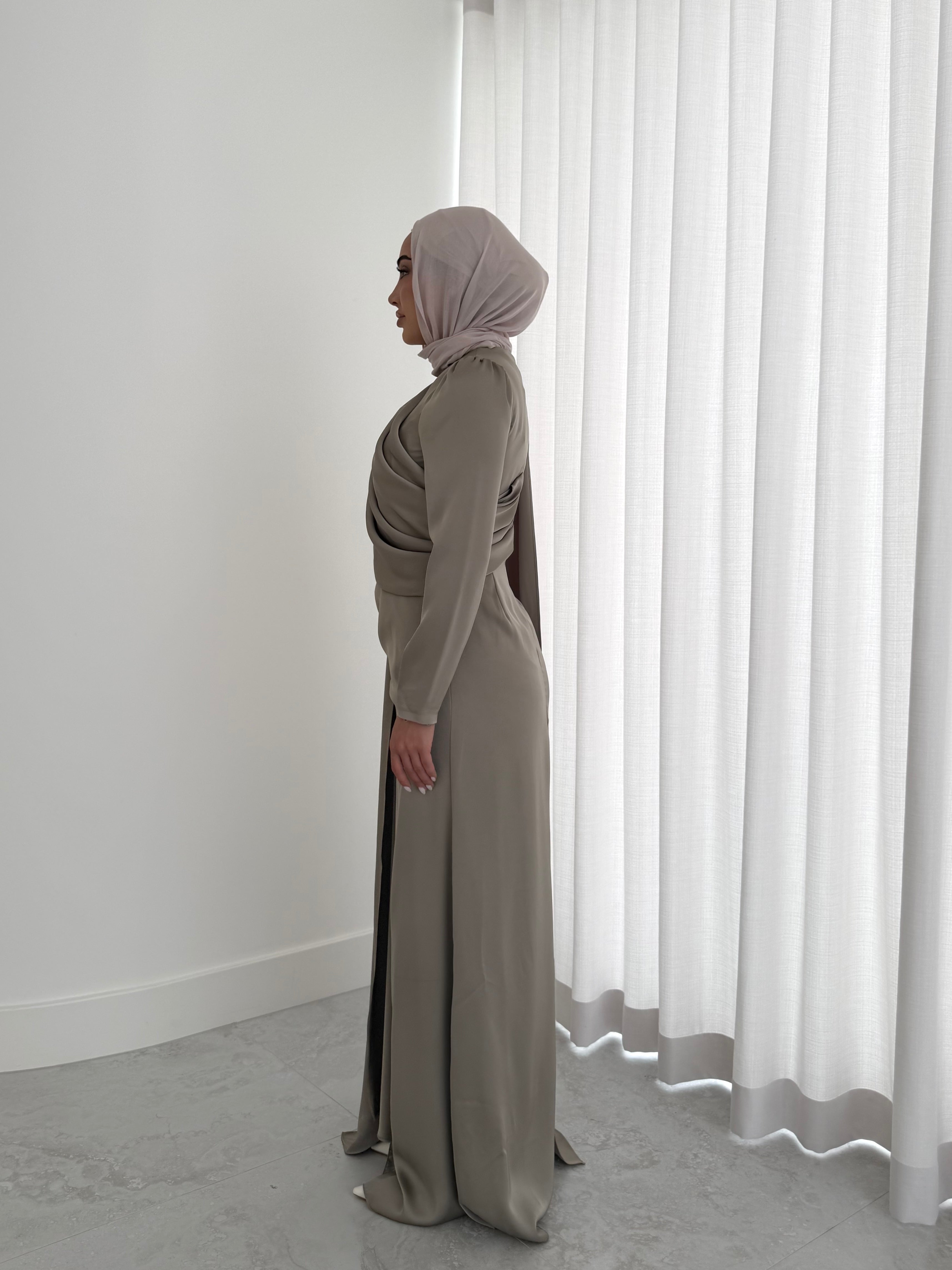 women's full length formal dress in satin, maxi with long sleeves. soft satin drape in lightweight fabrication for spring summer day or night event. hijabi friendly, modest and full coverage for prom, formals, engagements, kk, nikkah, fatiha, wedding guest.