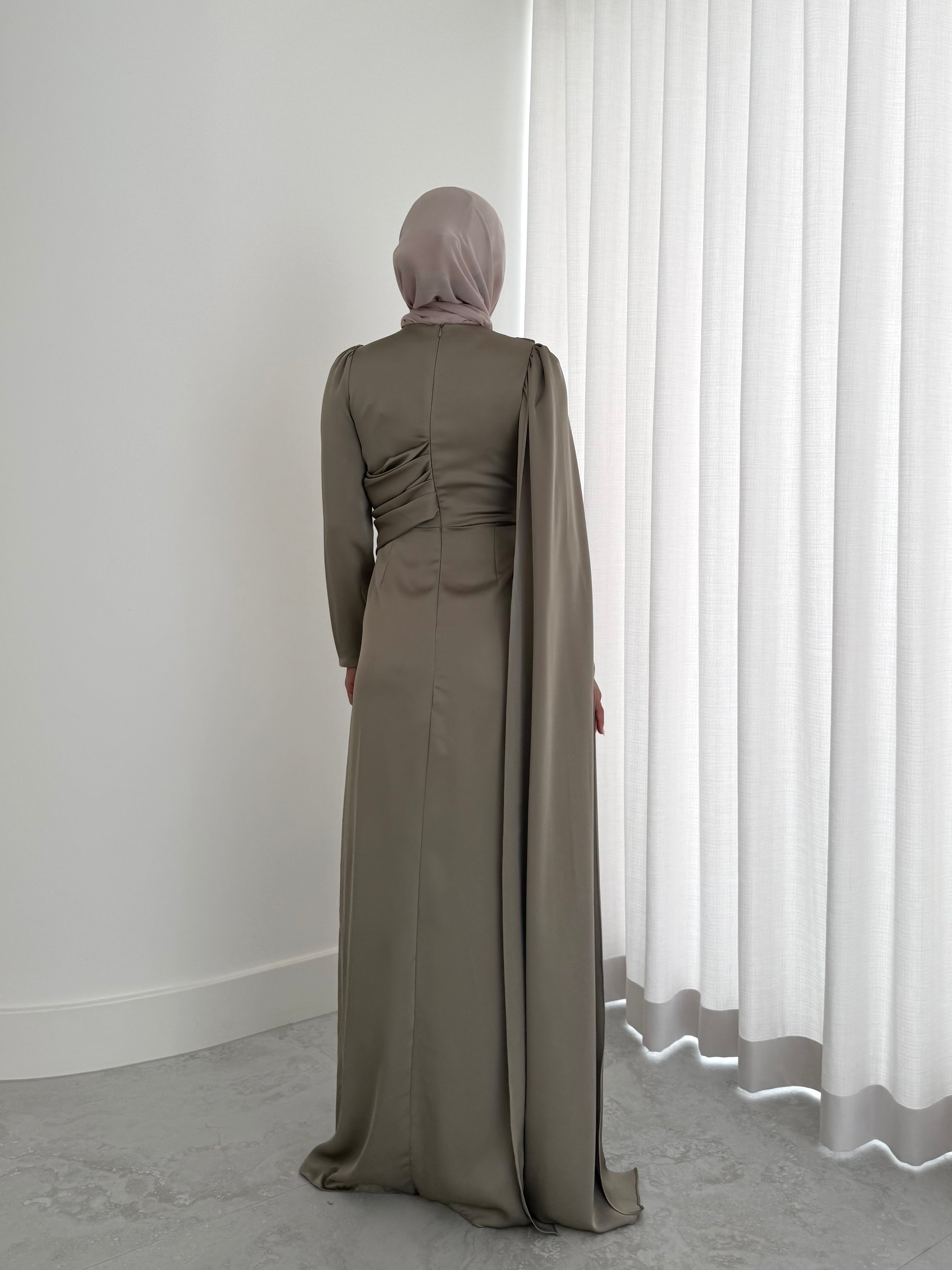 women's full length formal dress in satin, maxi with long sleeves. soft satin drape in lightweight fabrication for spring summer day or night event. hijabi friendly, modest and full coverage for prom, formals, engagements, kk, nikkah, fatiha, wedding guest.