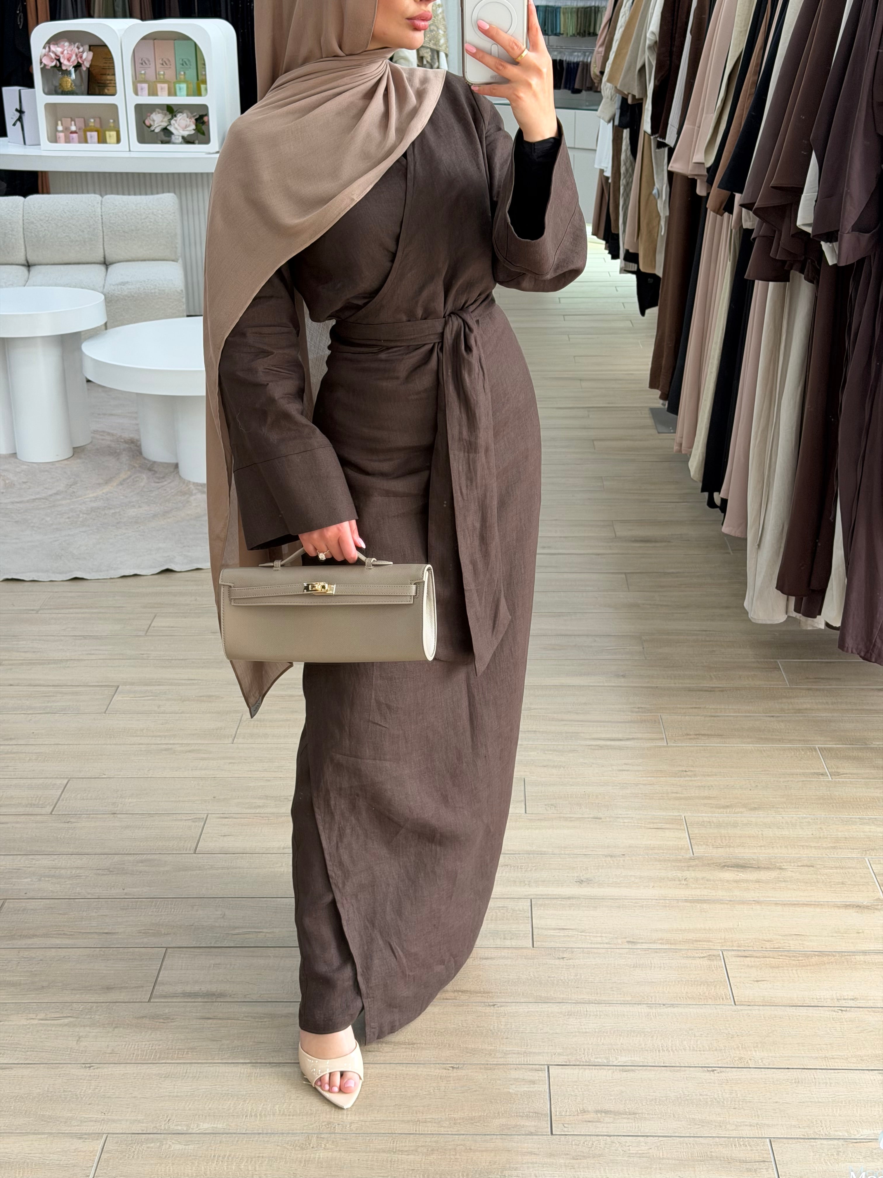 model wearing linen wrap tie dress with scarf in neutral shades