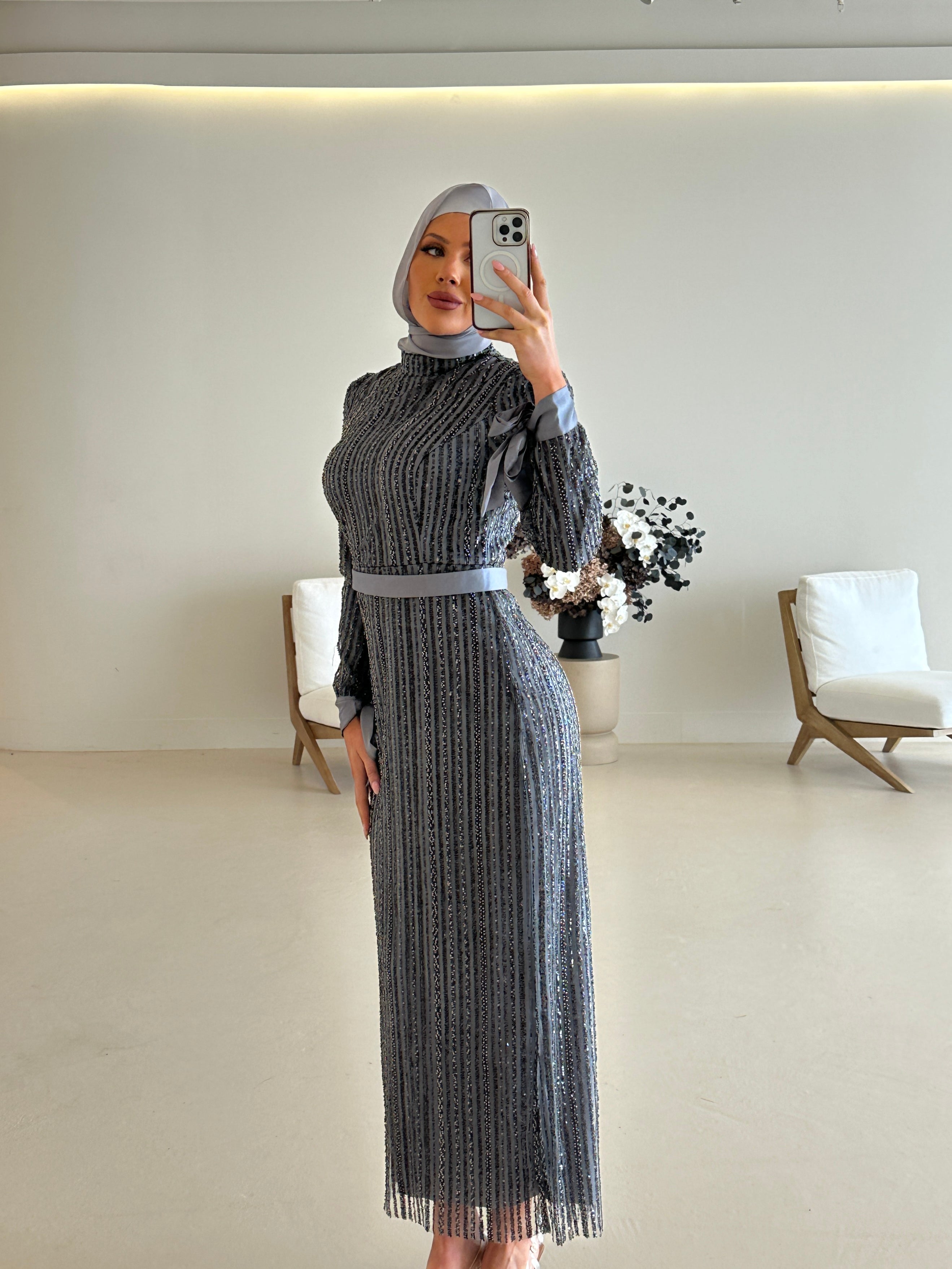 women wearing modest embellished formal dress, maxi, long sleeve with hijab in grey