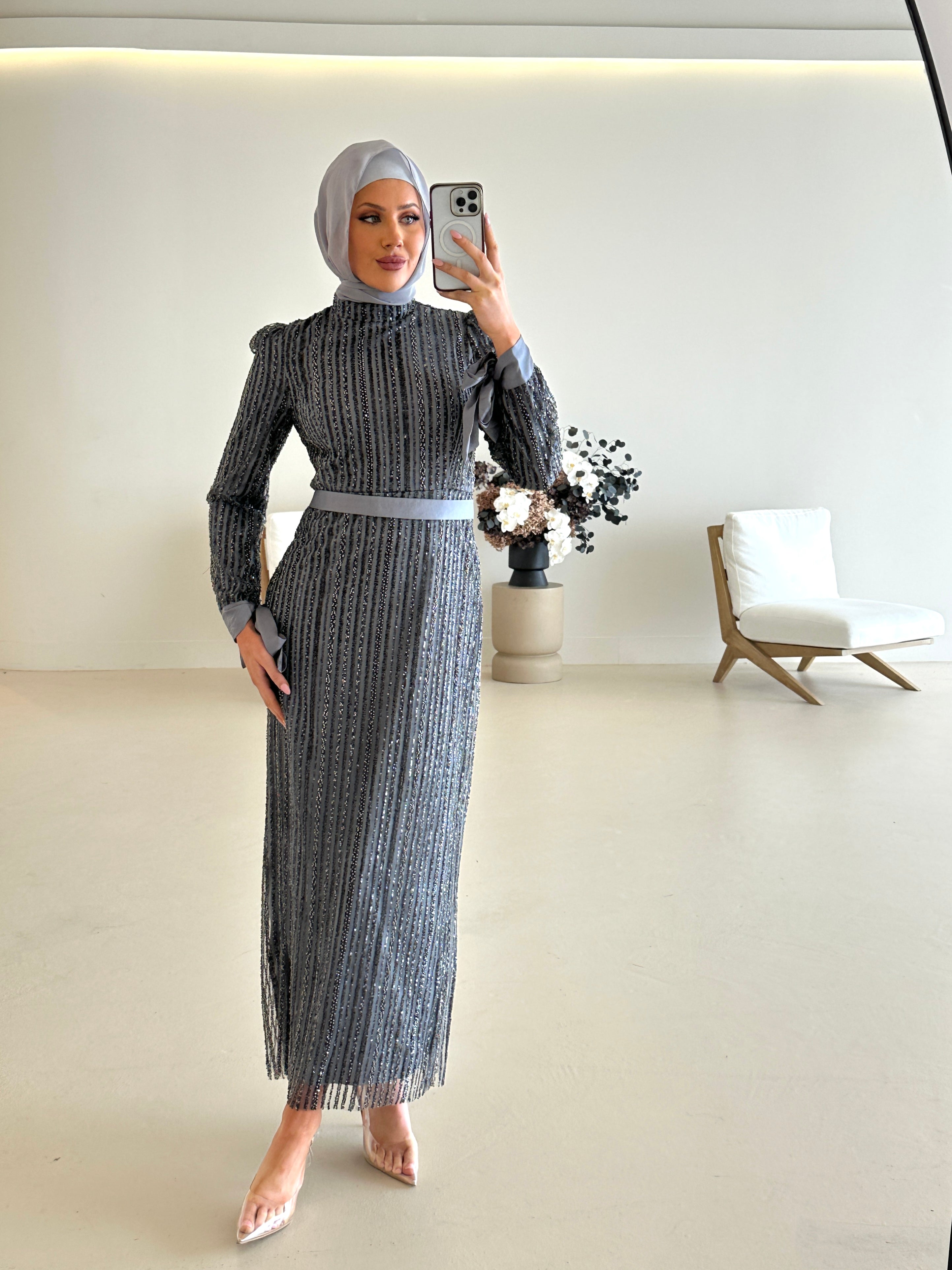 women wearing modest embellished formal dress, maxi, long sleeve with hijab in grey