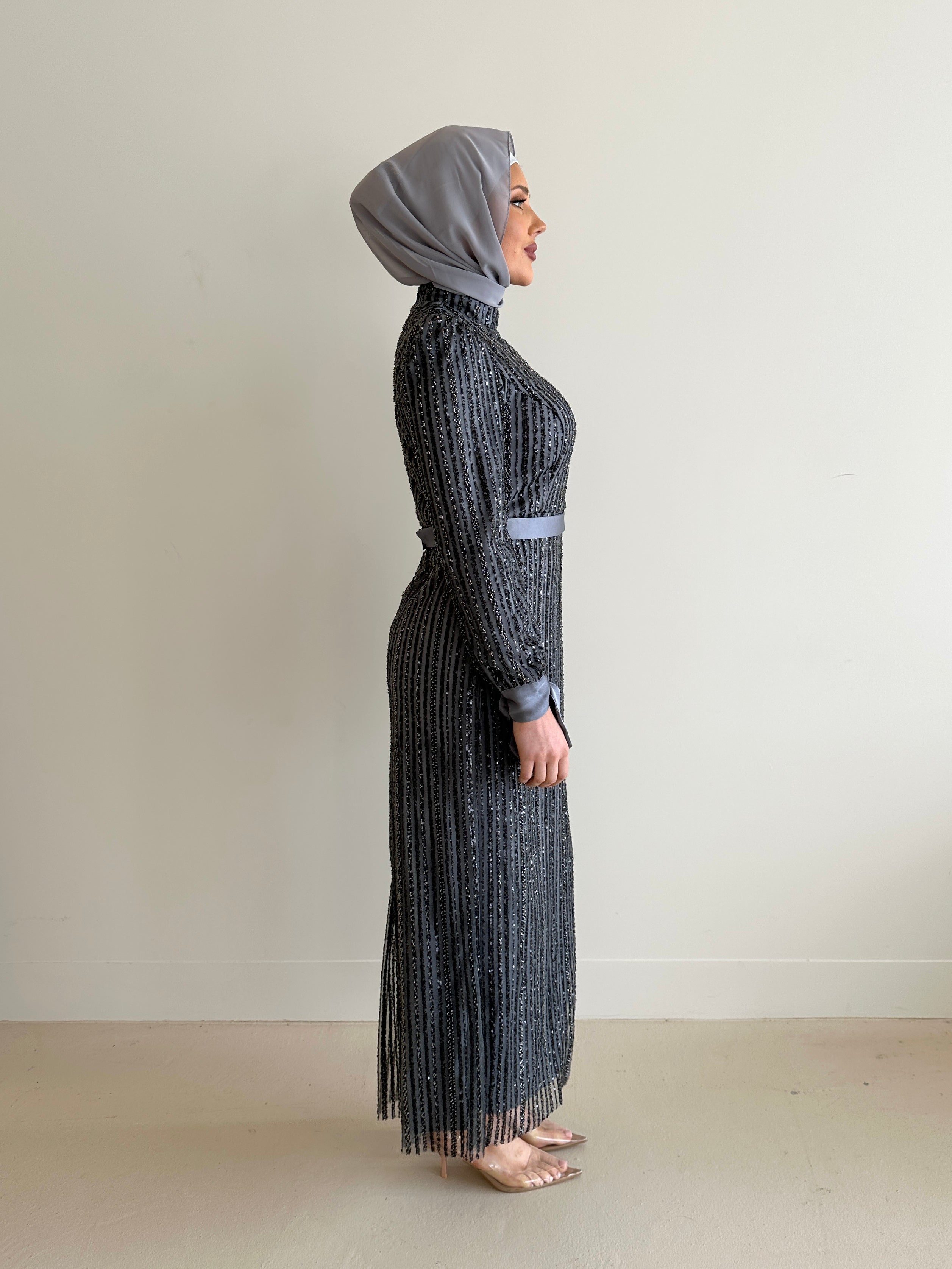 women wearing modest embellished formal dress, maxi, long sleeve with hijab in grey