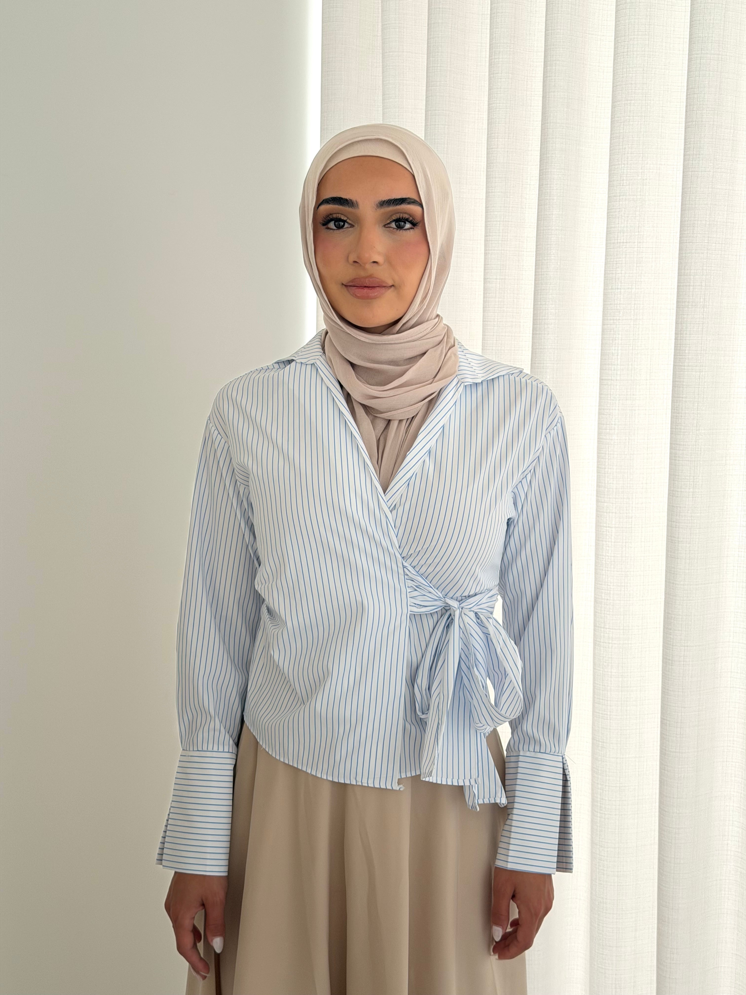 women's wrap tie, pinstripe shirt in sky blue and white for spring summer days - casual, semi-formal and cooperate modest fashion look. hijabi fiendly.
