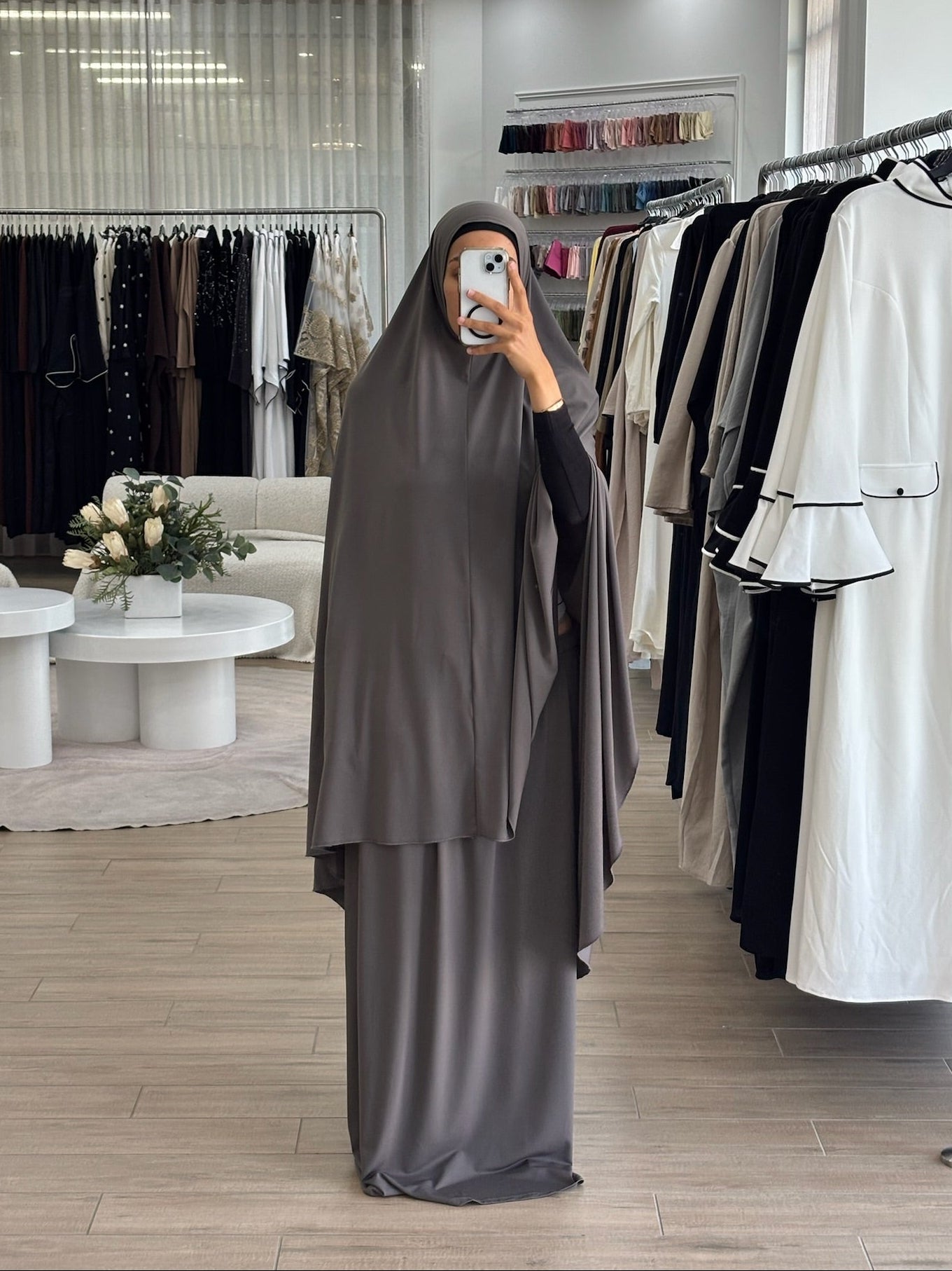 Model wearing a prayer set with a loose, flowing silhouette, designed for comfortable and modest prayer wear.