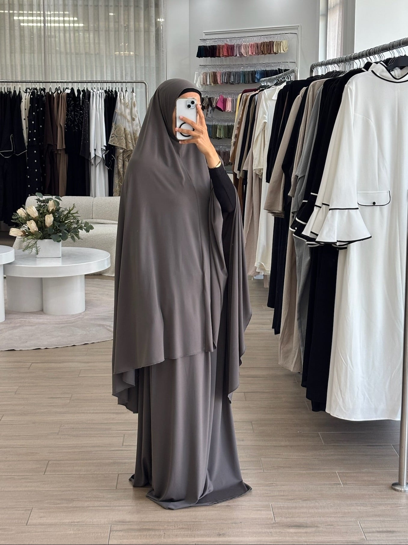 Model wearing a prayer set with a loose, flowing silhouette, designed for comfortable and modest prayer wear.