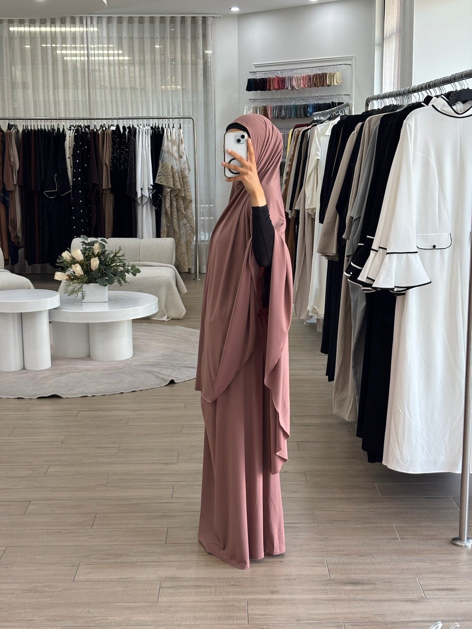 Model wearing a prayer set with a loose, flowing silhouette, designed for comfortable and modest prayer wear.