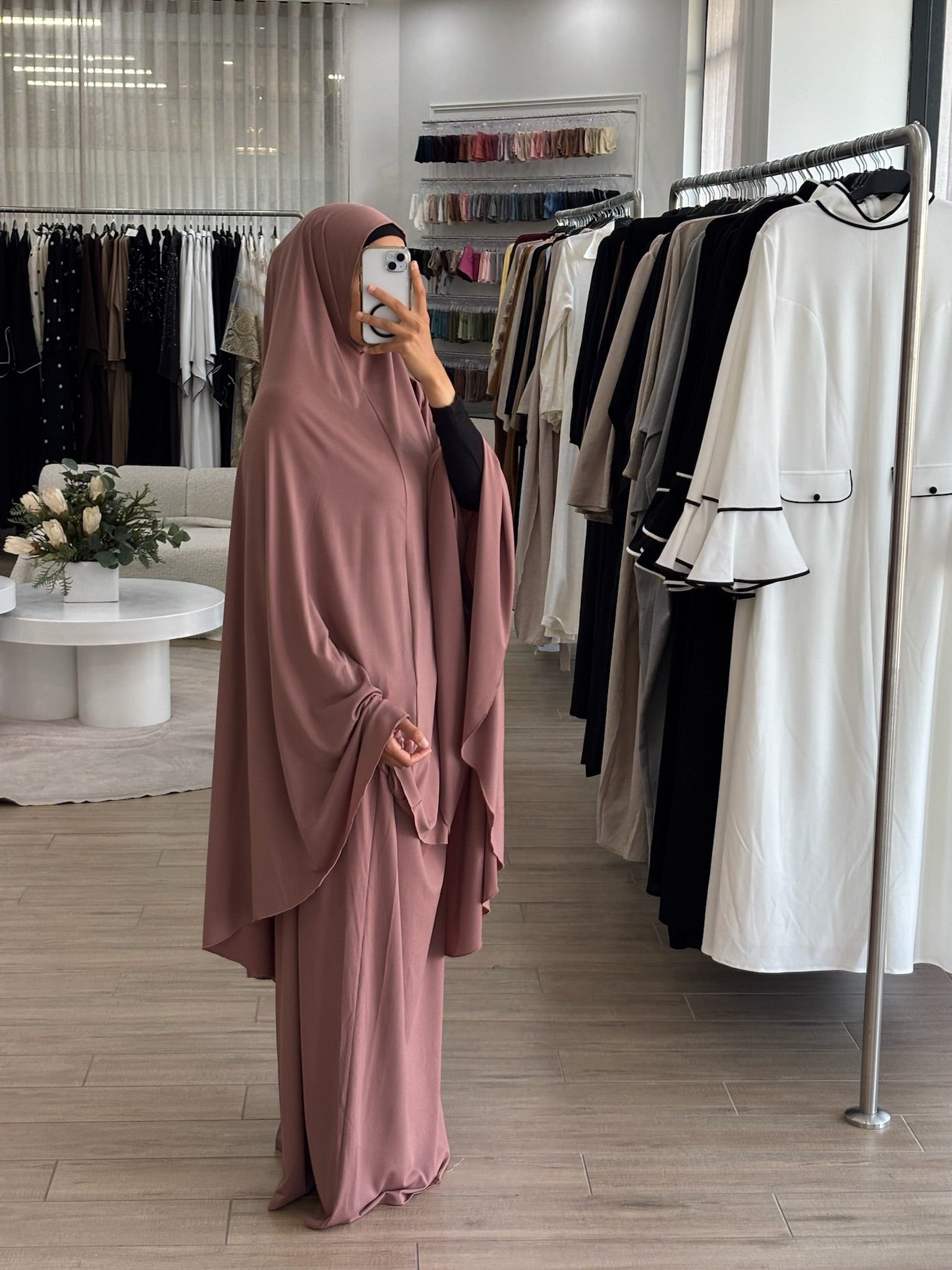 Model wearing a prayer set with a loose, flowing silhouette, designed for comfortable and modest prayer wear.