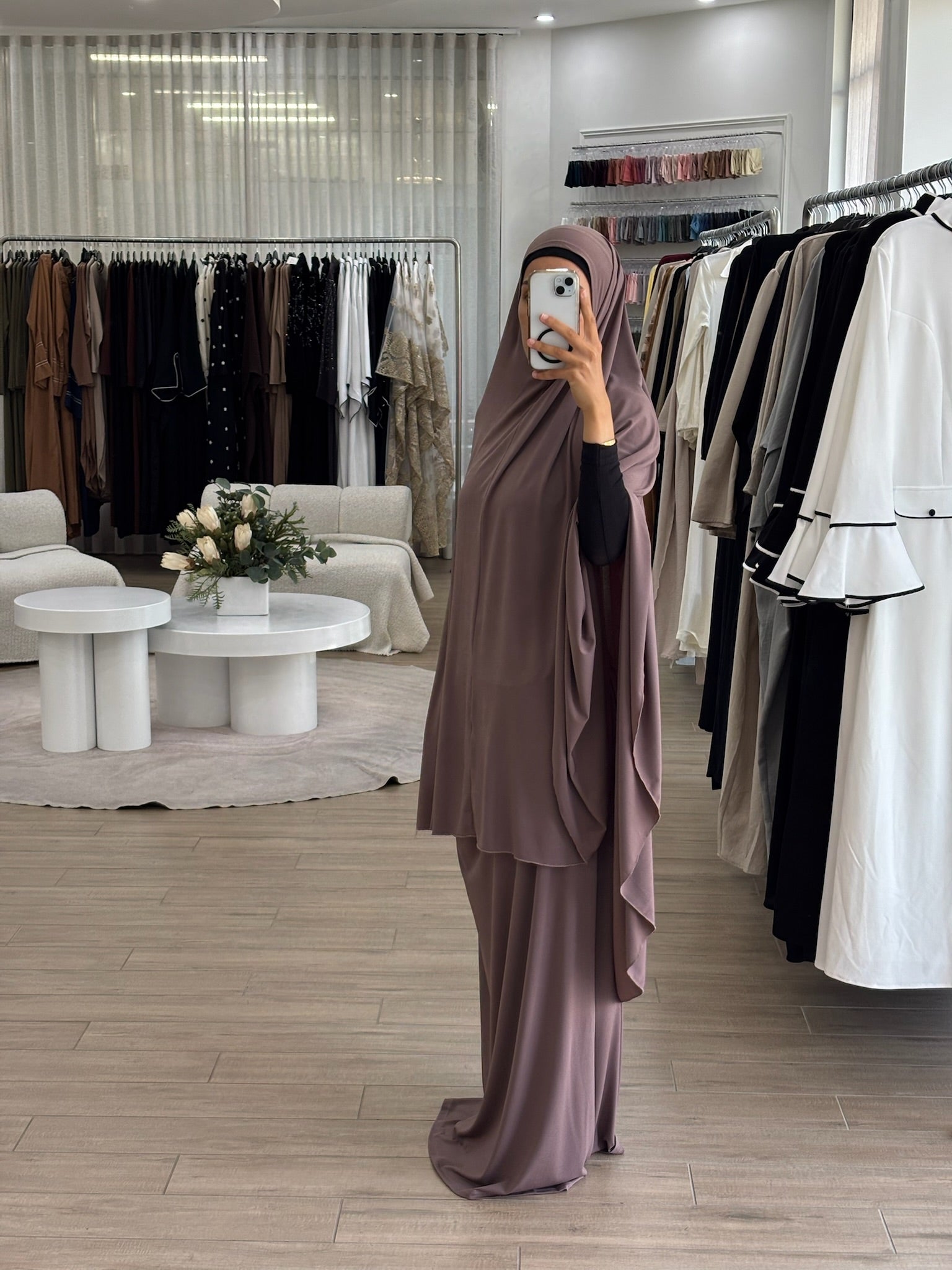 Model wearing a prayer set with a loose, flowing silhouette, designed for comfortable and modest prayer wear.