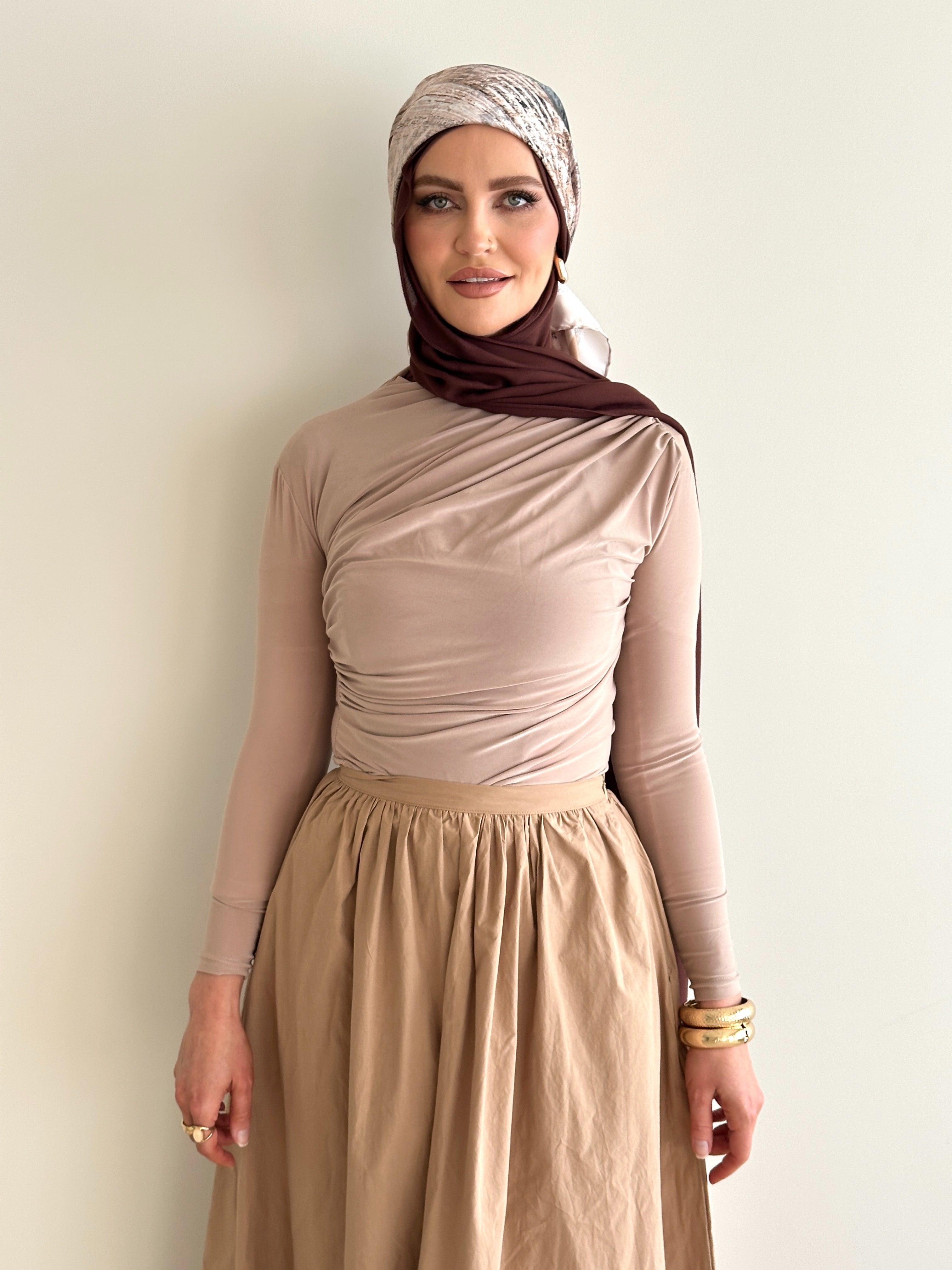 women's long sleeve body top, essential for layering with draping detail