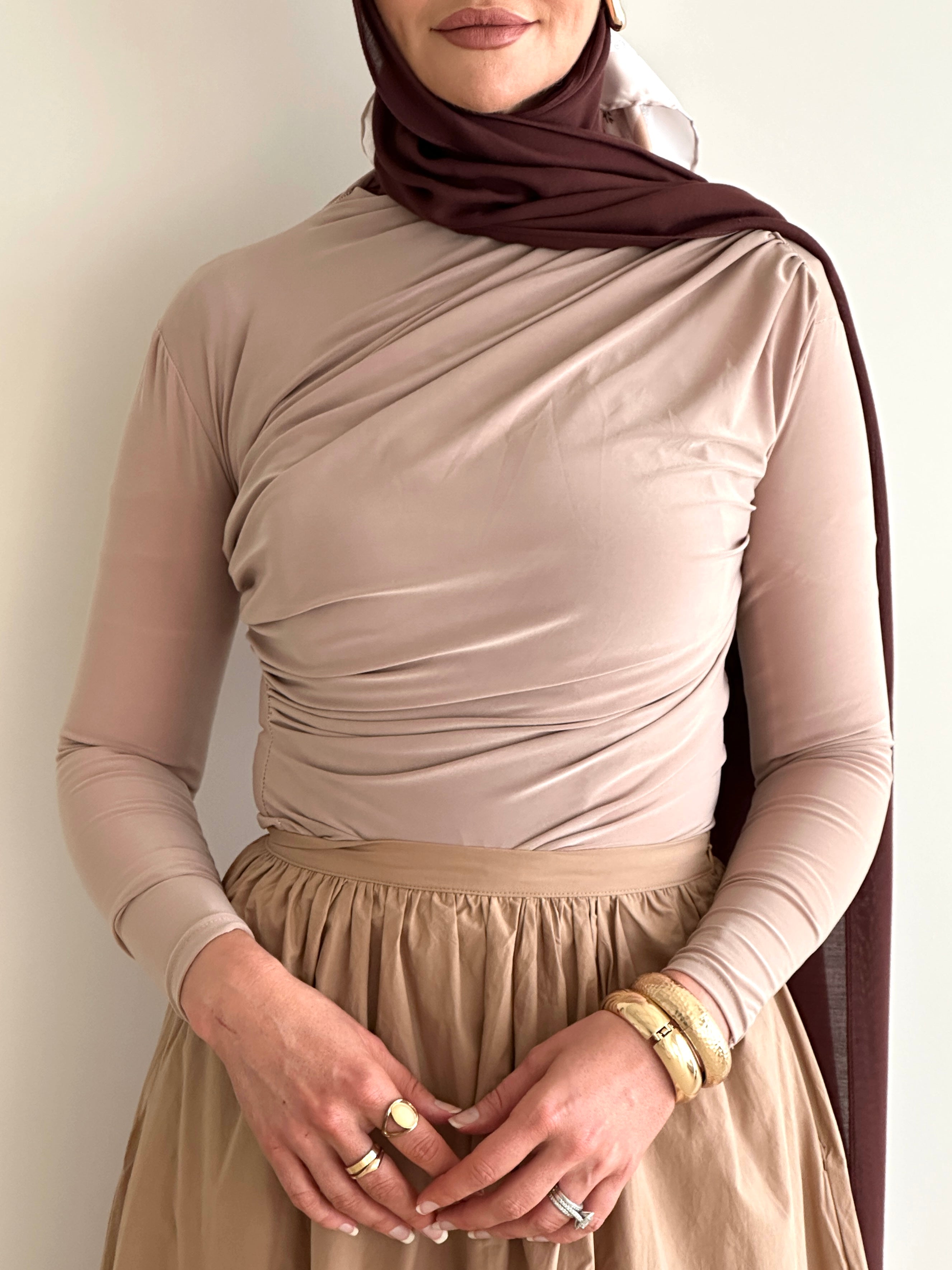women's long sleeve body top, essential for layering with draping detail