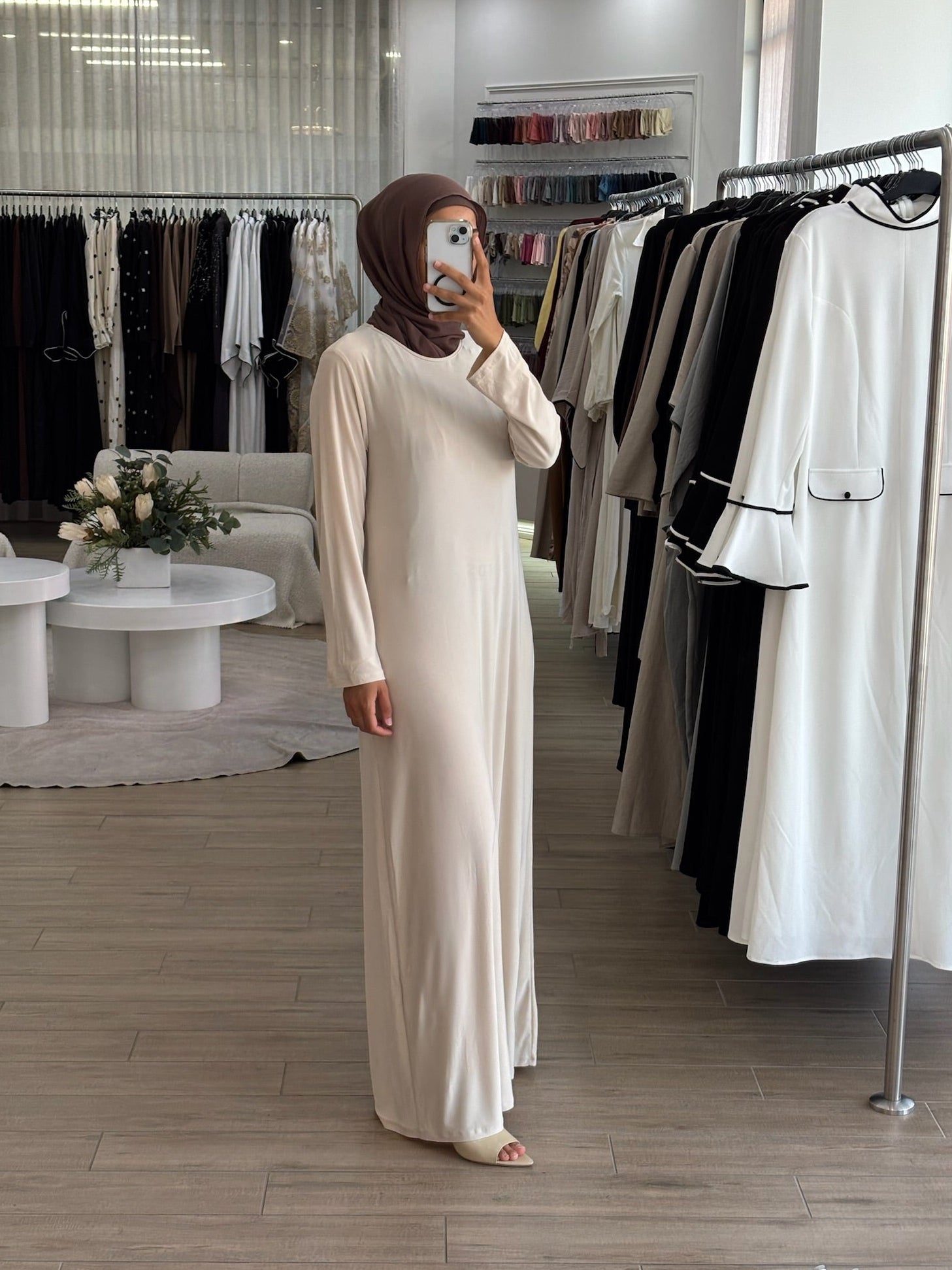 Model wearing the Staple Lycra dress featuring a smooth, streamlined silhouette in stretch lycra fabric, styled for everyday modest wear.