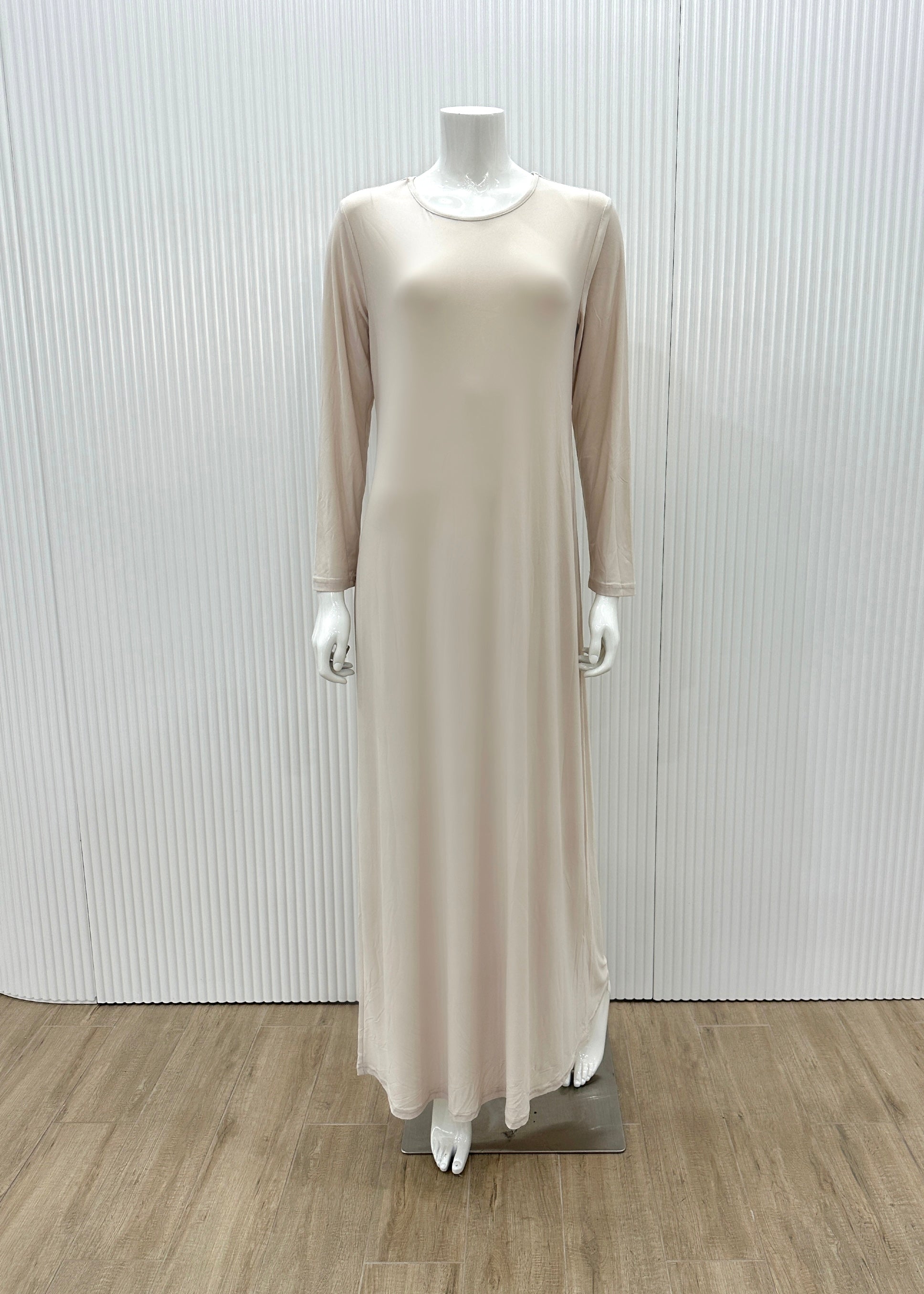 Model wearing the Staple Lycra dress featuring a smooth, streamlined silhouette in stretch lycra fabric, styled for everyday modest wear.