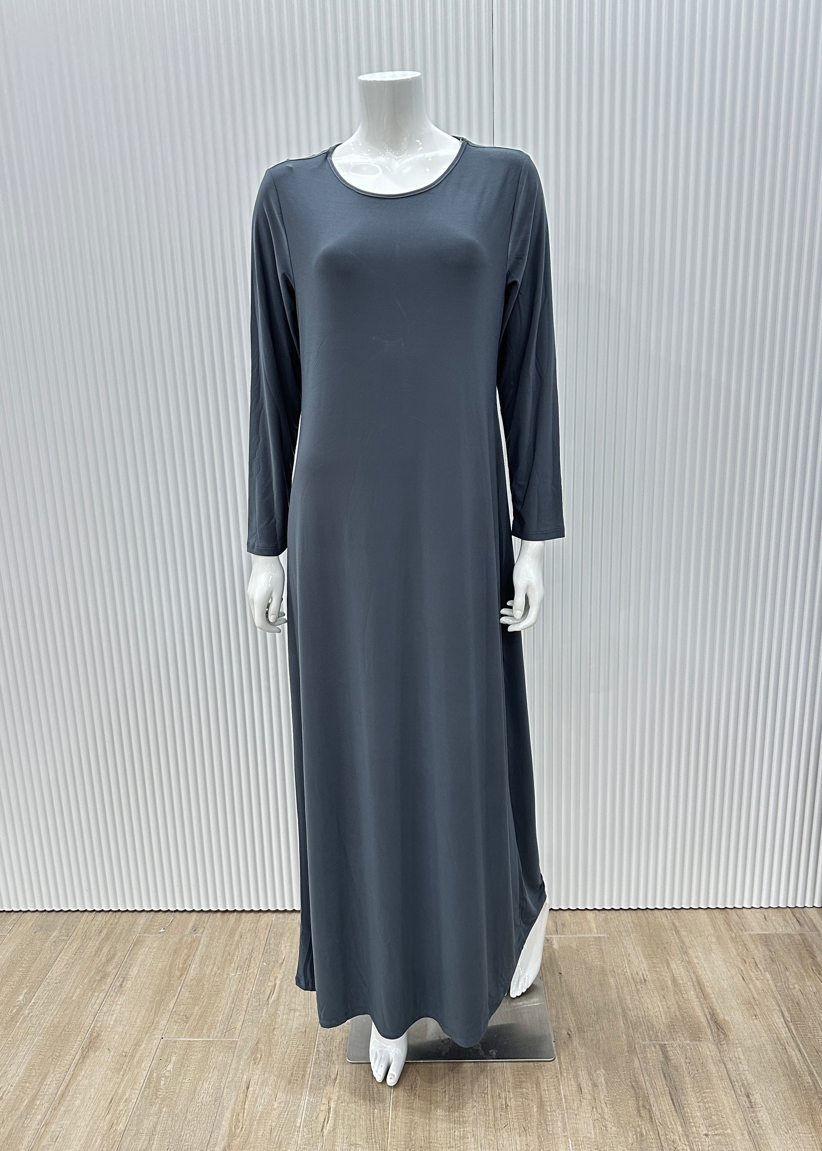 Model wearing the Staple Lycra dress featuring a smooth, streamlined silhouette in stretch lycra fabric, styled for everyday modest wear.