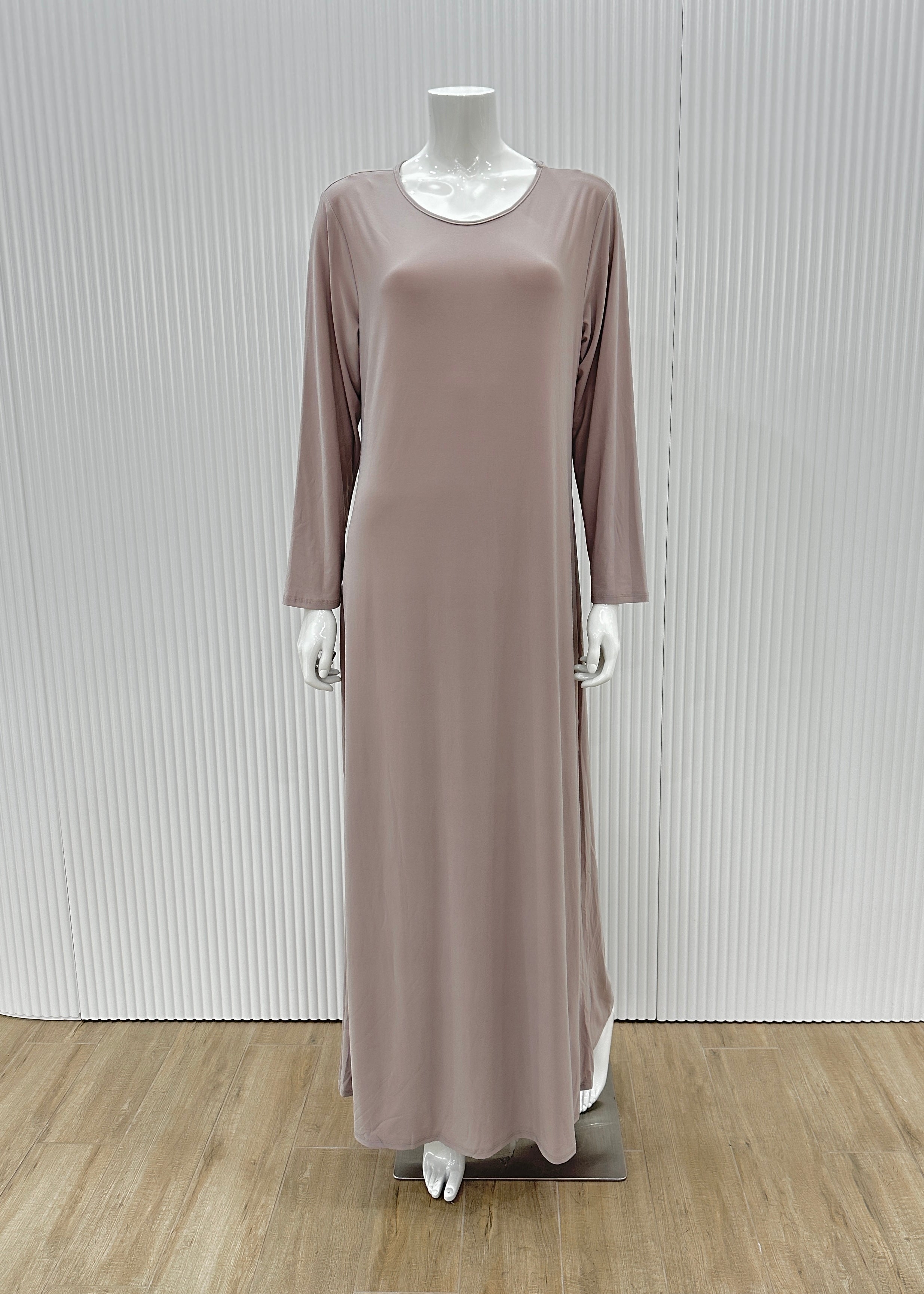 Model wearing the Staple Lycra dress featuring a smooth, streamlined silhouette in stretch lycra fabric, styled for everyday modest wear.