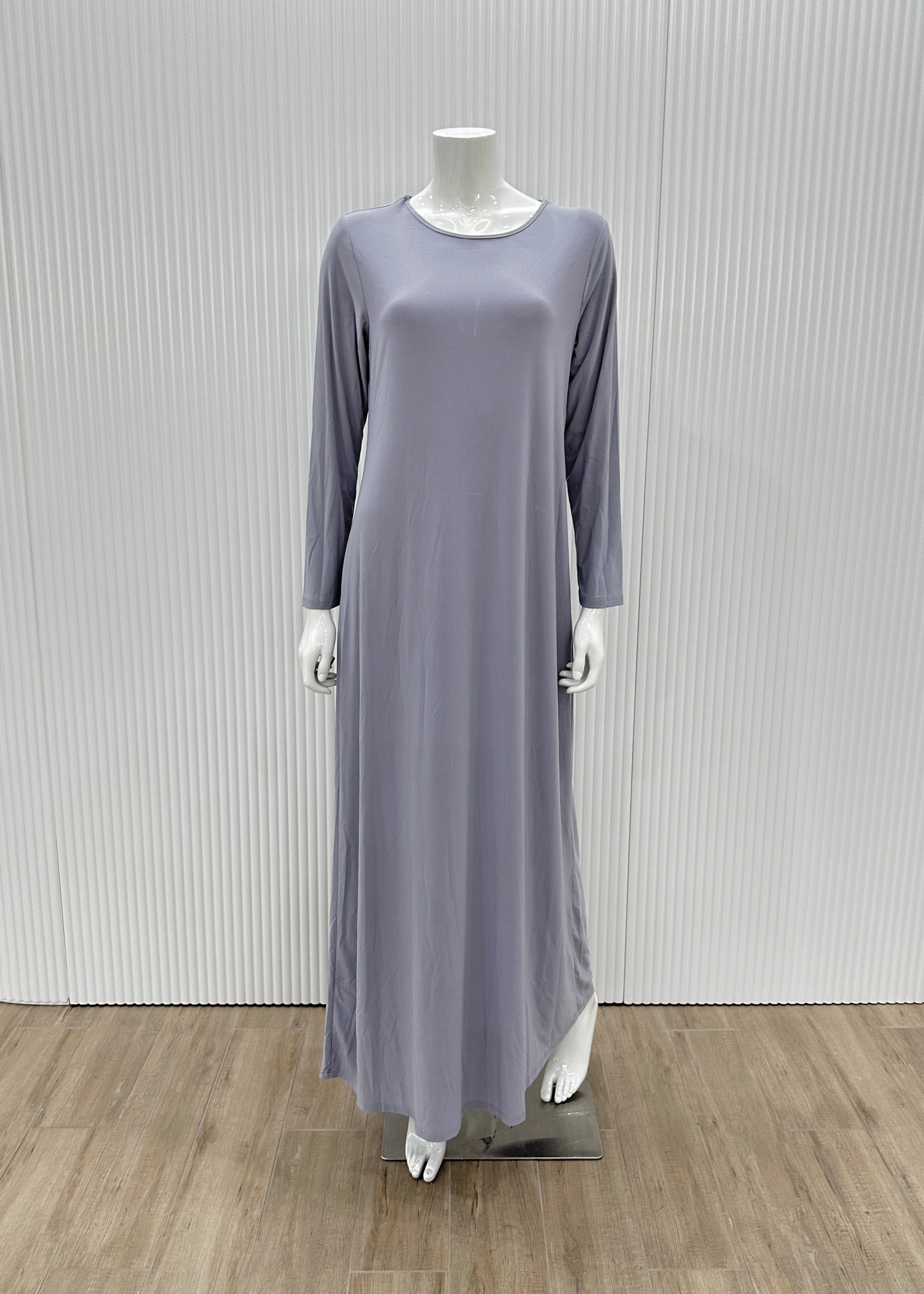 Model wearing the Staple Lycra dress featuring a smooth, streamlined silhouette in stretch lycra fabric, styled for everyday modest wear.