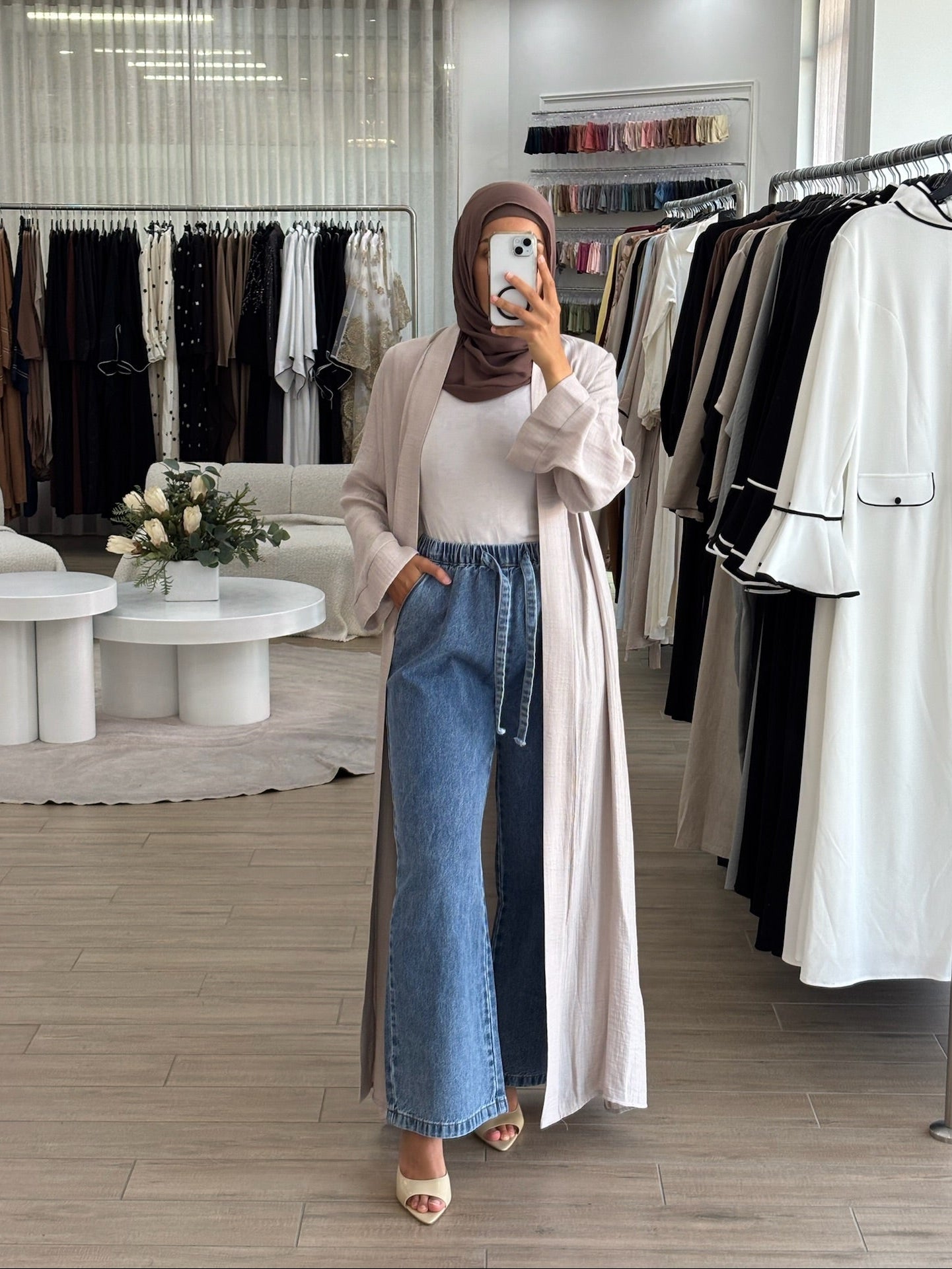 Straight-flow denim pants in mid blue, featuring a relaxed wide-leg cut with a high-waisted fit and smooth structured drape.