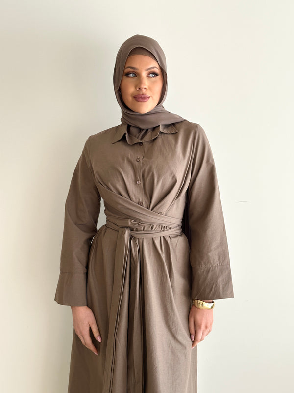 woman wearing modest long sleeve maxi spring/summer dress in mocha, full length, lightweight and wrap dress with buttons