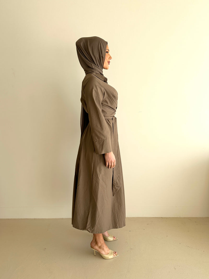 woman wearing modest long sleeve maxi spring/summer dress in mocha, full length, lightweight and wrap dress with buttons
