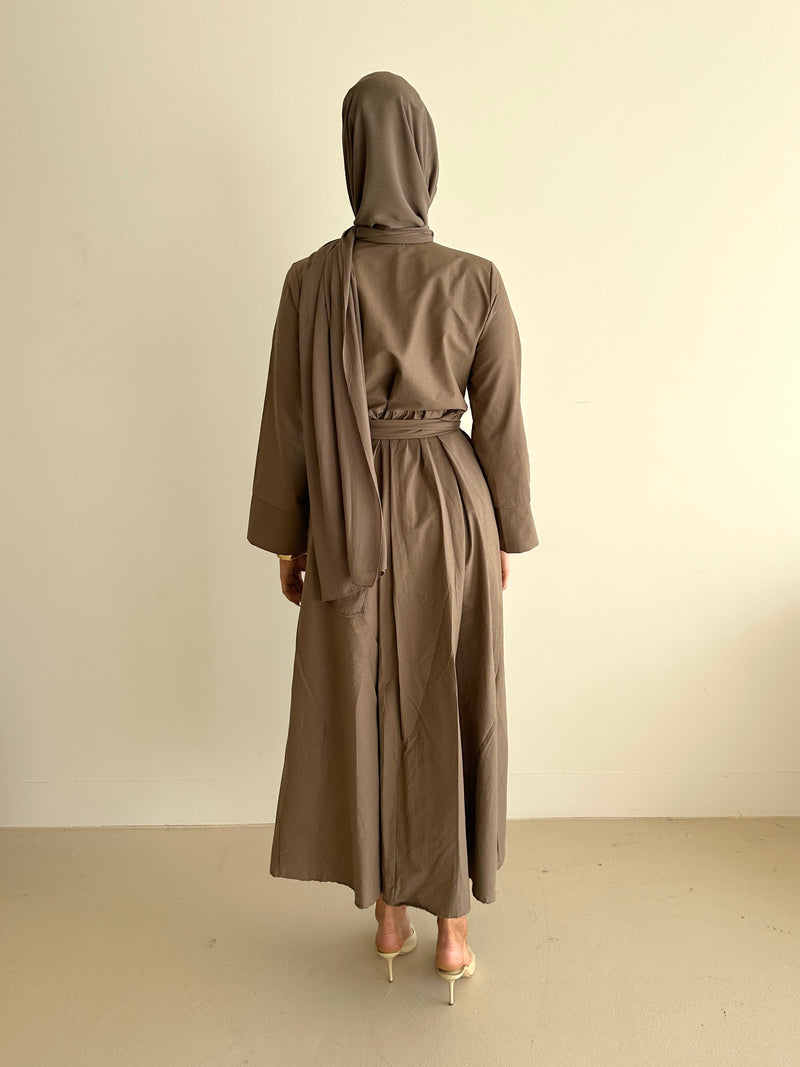 woman wearing modest long sleeve maxi spring/summer dress in mocha, full length, lightweight and wrap dress with buttons