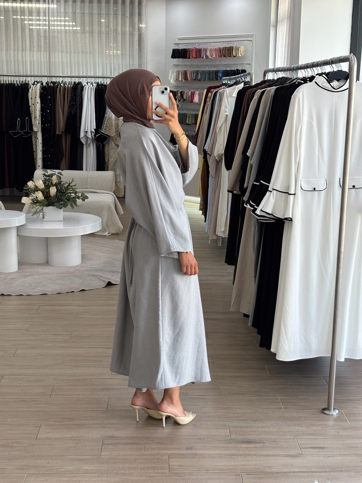 Back view of a wrap two-way dress with a relaxed fit and modest coverage.