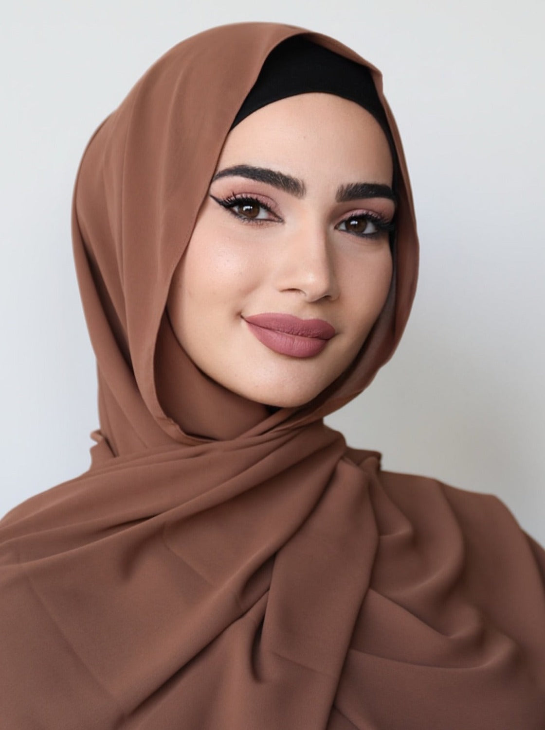 The Opaque Long Scarf (hijab) by Veil Of Faith is made of a thick opaque crepe material.