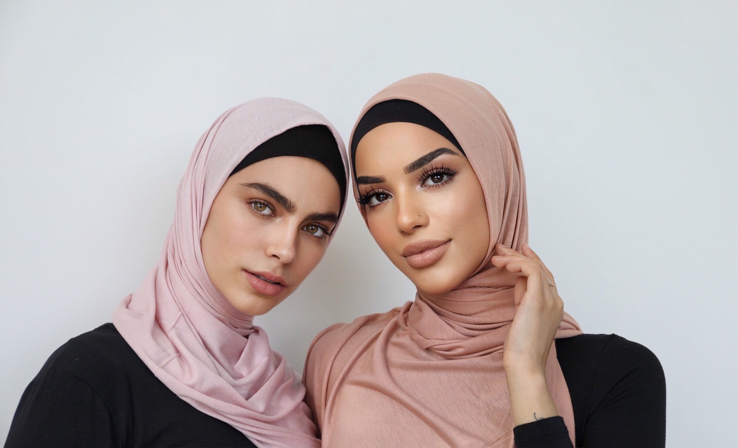 Signature jersey scarf made from soft, stretchy cotton with an extended length for easy wrapping and a secure, comfortable fit around the head.